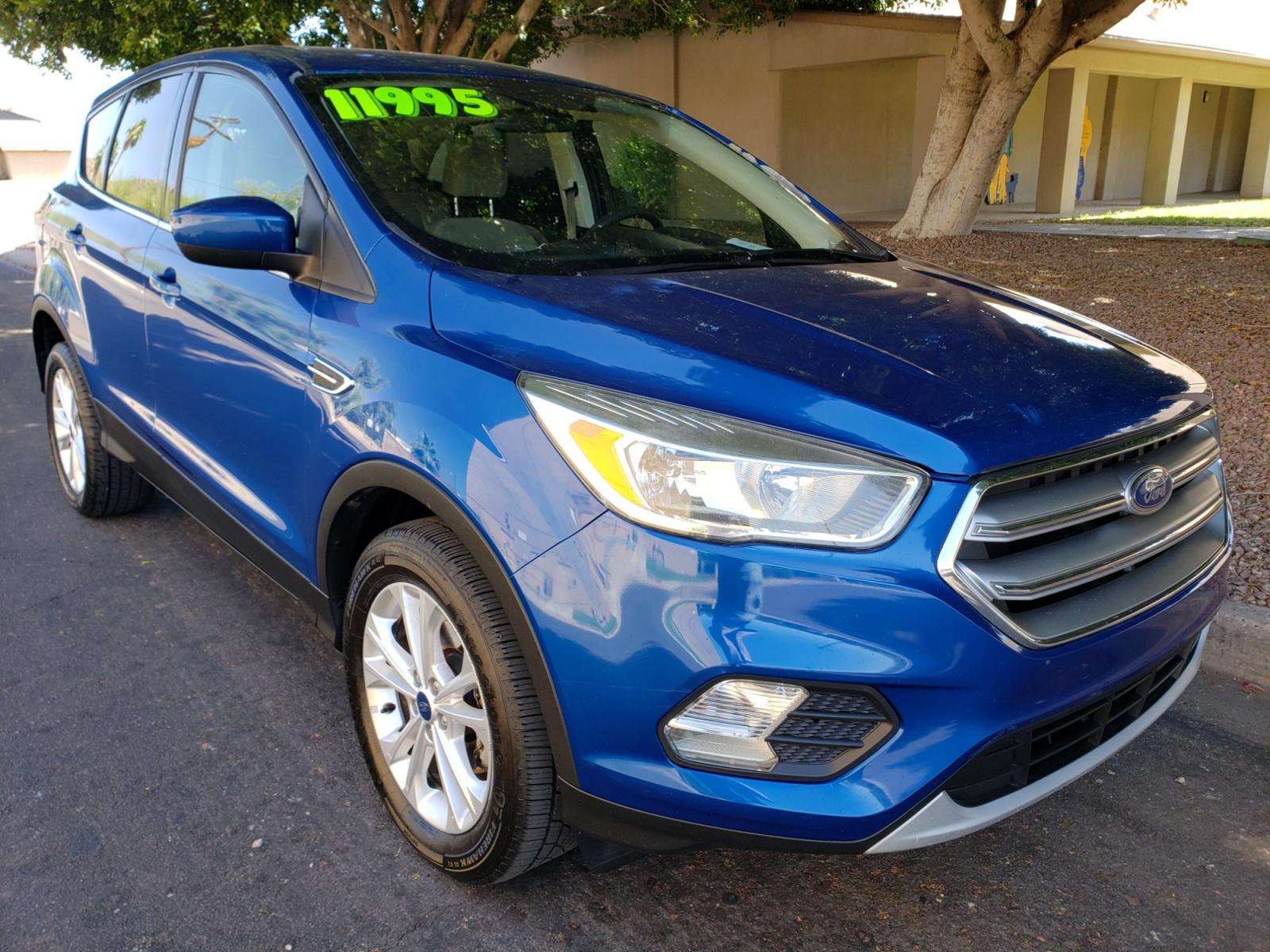 2017 /Tan and black Ford Escape SE FWD ( 1FMCU0GD4H) with an 1.5L L4 DOHC 16V engine, 6A transmission, located at 323 E Dunlap Ave., Phoenix, AZ, 85020, (602) 331-9000, 33.567677, -112.069000 - 2017 Ford Escape SE,.......EXCELLENT condition, ONLY 125K MILES!!.... Ice Cold A/C, Black and tan interior with tan cloth seats in near perfect condition, New Tires, New brakes, Tune up, Stereo/CD Player, Bluetooth, Phone sync, Backuup camera, Satellite compatible, This suv is gorgeous inside and ou - Photo #2