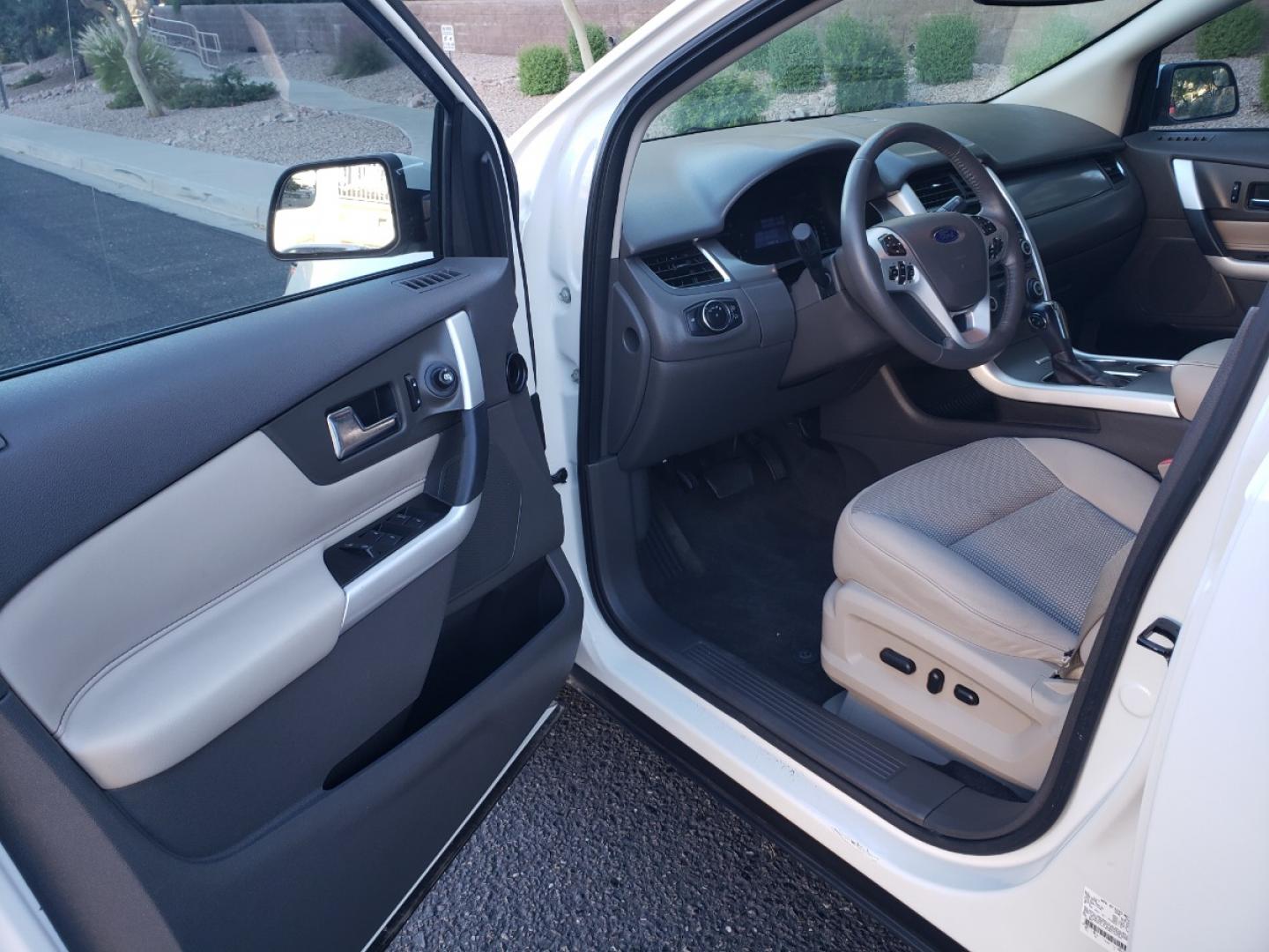 2013 /gray Ford Edge SEL FWD (2FMDK3JC2DB) with an 3.5L V6 DOHC 24V engine, 6-Speed Automatic transmission, located at 323 E Dunlap Ave., Phoenix, AZ, 85020, (602) 331-9000, 33.567677, -112.069000 - 2013 Ford Edge SEL, EXCELLENT condition, Ice Cold A/C front and back, Gray and tan interior with tan cloth seats in near perfect condition, New brakes, Tune up, Stereo/CD player, Phone sync, Bluetooth, Satellite compatible, This suv is gorgeous inside and out, Incredible gas mileage! Arizona title , - Photo#8