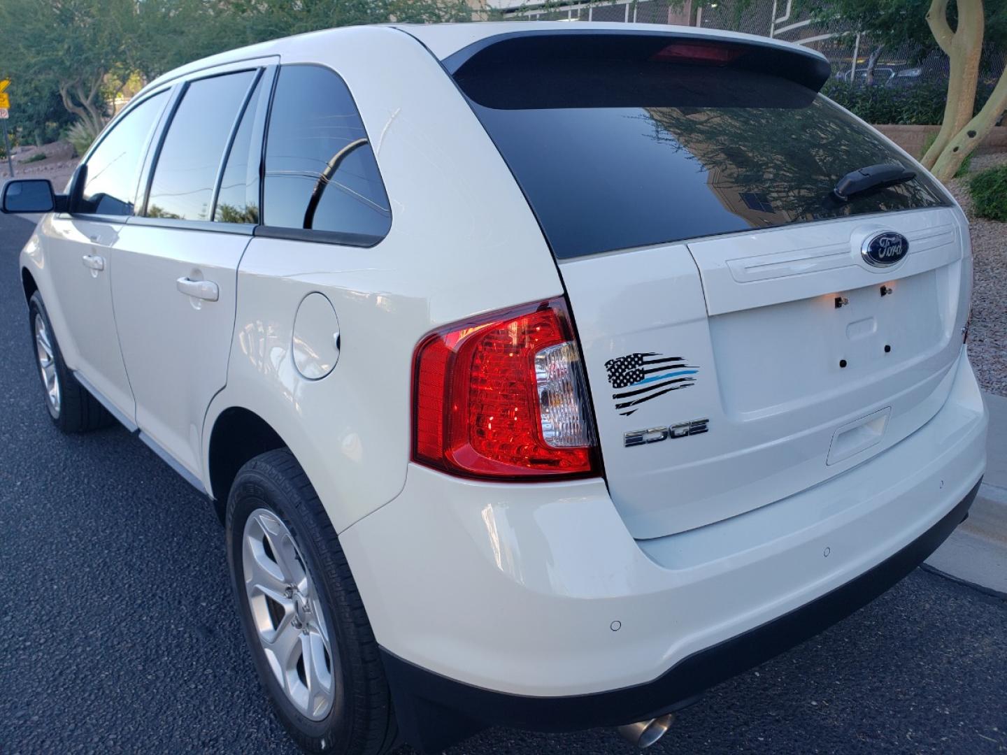 2013 /gray Ford Edge SEL FWD (2FMDK3JC2DB) with an 3.5L V6 DOHC 24V engine, 6-Speed Automatic transmission, located at 323 E Dunlap Ave., Phoenix, AZ, 85020, (602) 331-9000, 33.567677, -112.069000 - 2013 Ford Edge SEL, EXCELLENT condition, Ice Cold A/C front and back, Gray and tan interior with tan cloth seats in near perfect condition, New brakes, Tune up, Stereo/CD player, Phone sync, Bluetooth, Satellite compatible, This suv is gorgeous inside and out, Incredible gas mileage! Arizona title , - Photo#5