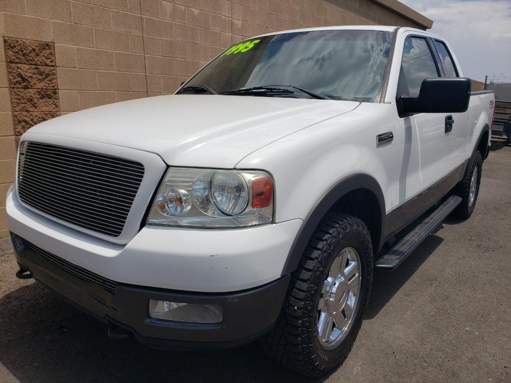 2004 WHITE /black Ford F-150 FX4 SuperCab 4WD (1FTPX14584K) with an 5.4L V6 SOHC 16V engine, 4-Speed Automatic Overdrive transmission, located at 323 E Dunlap Ave., Phoenix, AZ, 85020, (602) 331-9000, 33.567677, -112.069000 - 2004 Ford F-150 FX4,........EXCELLENT condition, No accidents, A MUST SEE!!.... Ice cold a/c, Black interior with Beautiful black cloth seats are in like new condition, Sliding rear window, Beautiful tinted sunroof, Stereo/CD player, Rear receiver, Goodyear Wrangler A/T tires, Running boards, Clean - Photo #0