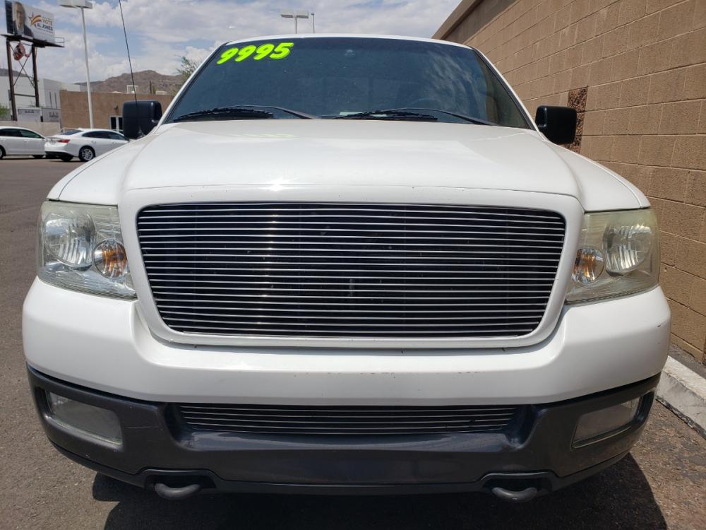 2004 WHITE /black Ford F-150 FX4 SuperCab 4WD (1FTPX14584K) with an 5.4L V6 SOHC 16V engine, 4-Speed Automatic Overdrive transmission, located at 323 E Dunlap Ave., Phoenix, AZ, 85020, (602) 331-9000, 33.567677, -112.069000 - Photo #1