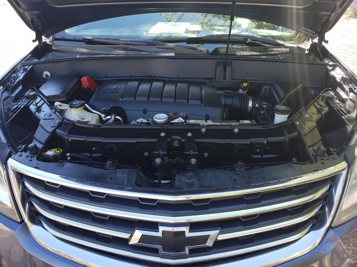 2013 BLUE /gray and black Chevrolet Traverse 1LT FWD (1GNKRGKD1DJ) with an 3.6L V6 DOHC 24V engine, 6-Speed Automatic transmission, located at 323 E Dunlap Ave., Phoenix, AZ, 85020, (602) 331-9000, 33.567677, -112.069000 - 2013 Chevrolet Traverse LT,..... EXCELLENT condition, Cold A/C front and back, Clean black and gray interior with black cloth seats in near perfect condition, Third row seating, New brakes, Tune up, Stereo/CD Player, Bluetooth, Phone sync, Back up camera, Satellite compatible, Cold Rear a/c, No acci - Photo#19