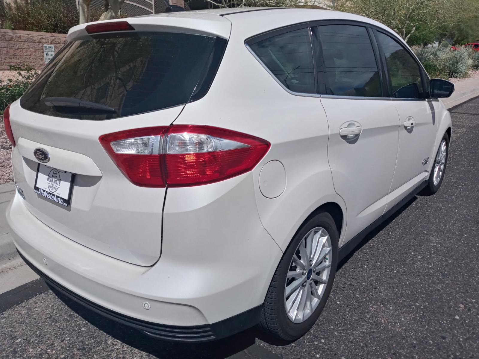 2015 WHITE /Gray and Cream Ford C-Max Energi SEL (1FADP5CU9FL) with an 2.0L L4 DOHC 16V HYBRID engine, Continuously Variable Transmission transmission, located at 323 E Dunlap Ave., Phoenix, AZ, 85020, (602) 331-9000, 33.567677, -112.069000 - 2015 Ford C-Max, ........A Must See!! No accidents, Ice cold AC. The car is gorgeous inside and out. Power windows, Power door locks, Touch screen Stereo/Cd player, Phone sync, Bluetooth, Satellite compatible, Navigation, Backup camera, Beautiful gray and black interior with gray Leather seats, Gorg - Photo #3