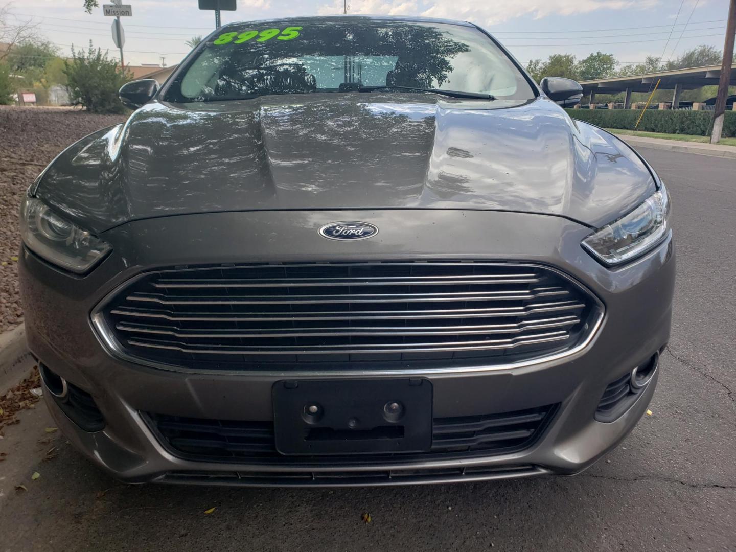 2013 gray /gray and black Ford Fusion Hybrid SE (3FA6P0LU1DR) with an 2.0L L4 DOHC 16V HYBRID engine, CVT transmission, located at 323 E Dunlap Ave., Phoenix, AZ, 85020, (602) 331-9000, 33.567677, -112.069000 - 2013 Ford Fusion Hybrid SE,........EXCELLENT condition, A Real Must See!!.... No accidents, Power everything, Stereo/cd player, Phone sync, Bluetooth, Navigation, Backup camera, Ice cold ac, Clean Gray and Black interior with black cloth seats in near perfect condition, power windows, power door loc - Photo#1