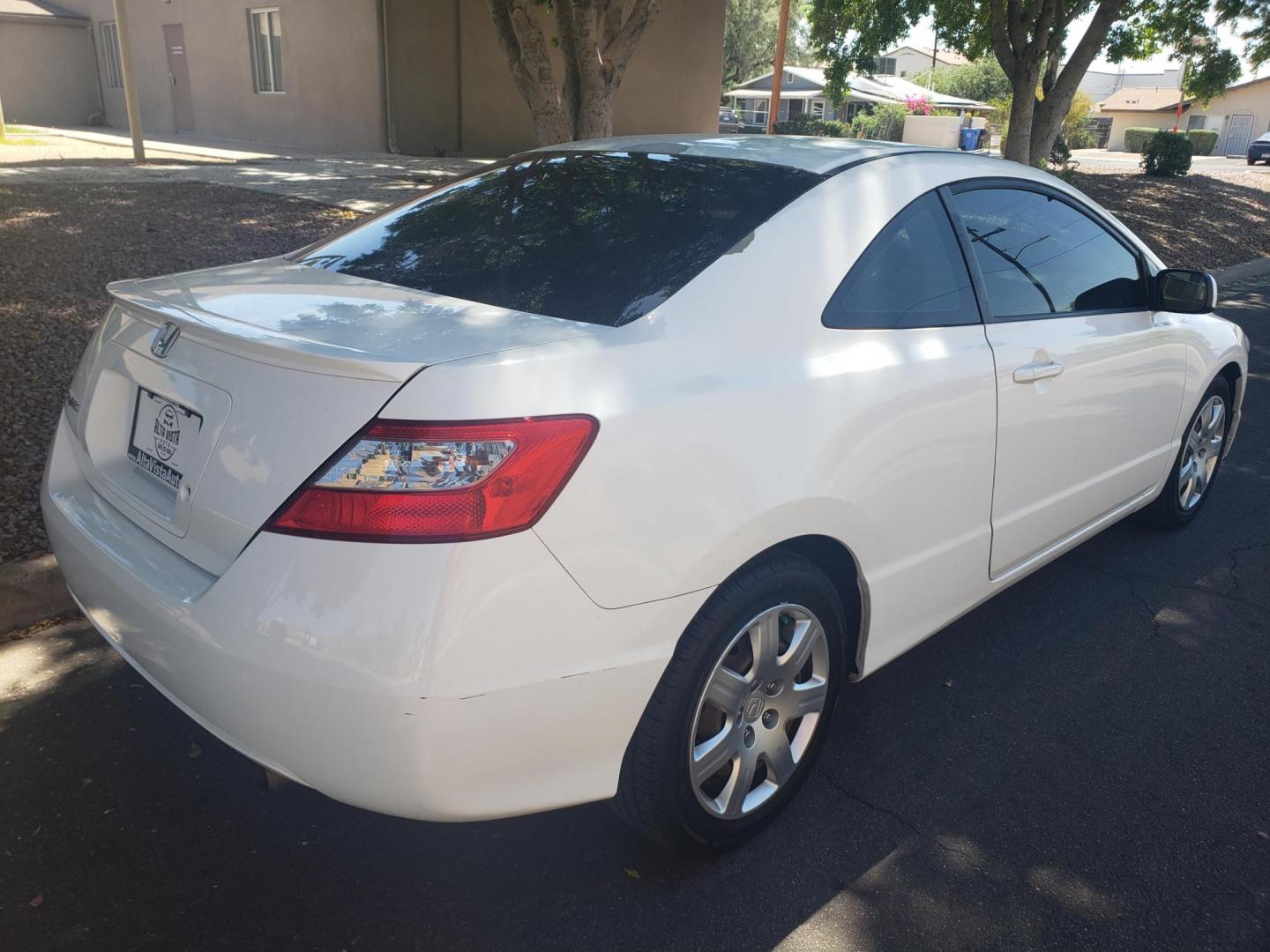 2010 Honda Civic LX Coupe 5-Speed AT (2HGFG1B6XAH) with an 1.8L L4 SOHC 16V engine, 5-Speed Automatic transmission, located at 323 E Dunlap Ave., Phoenix, AZ, 85020, (602) 331-9000, 33.567677, -112.069000 - Photo#3