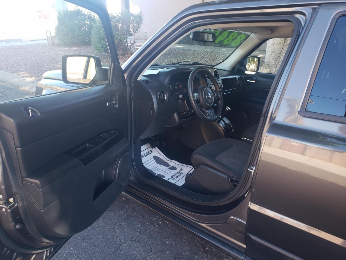 2017 gray /gray and black Jeep Patriot Sport 2WD (1C4NJPBA1HD) with an 2.0L L4 DOHC 16V engine, automatic transmission, located at 323 E Dunlap Ave., Phoenix, AZ, 85020, (602) 331-9000, 33.567677, -112.069000 - 2017 Jeep Patriot Sport 2WD,…….Ice Cold A/C, Clean gray and black interior with gray cloth seats in good condition, New brakes, Tune up, Stereo/CD Player, Bluetooth, Phone sync, Satellite compatible, This SUV is gorgeous inside and out, Incredible gas mileage! Arizona title , Runs and Drives E - Photo#8
