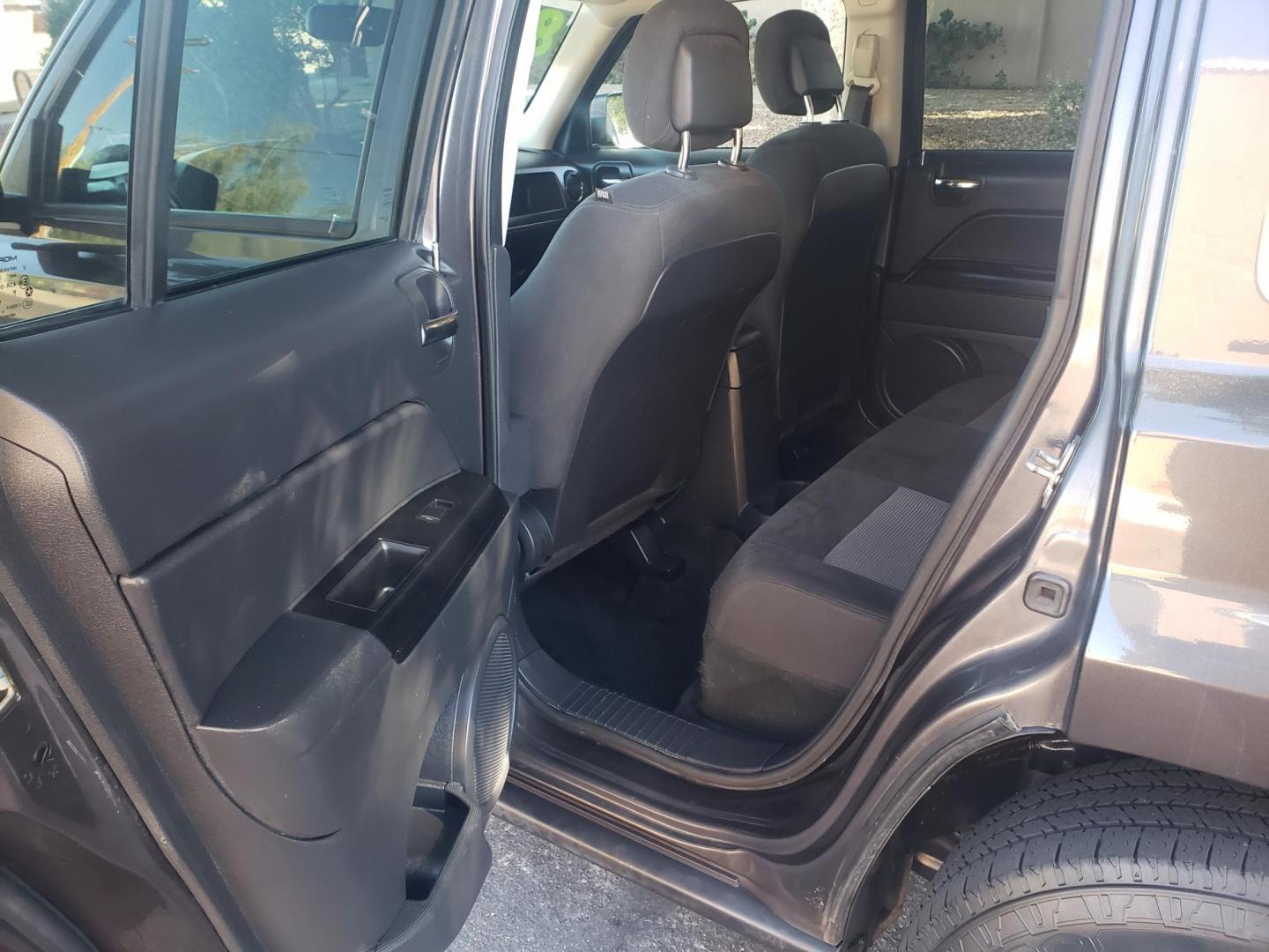 2017 gray /gray and black Jeep Patriot Sport 2WD (1C4NJPBA1HD) with an 2.0L L4 DOHC 16V engine, automatic transmission, located at 323 E Dunlap Ave., Phoenix, AZ, 85020, (602) 331-9000, 33.567677, -112.069000 - 2017 Jeep Patriot Sport 2WD,…….Ice Cold A/C, Clean gray and black interior with gray cloth seats in good condition, New brakes, Tune up, Stereo/CD Player, Bluetooth, Phone sync, Satellite compatible, This SUV is gorgeous inside and out, Incredible gas mileage! Arizona title , Runs and Drives E - Photo#10