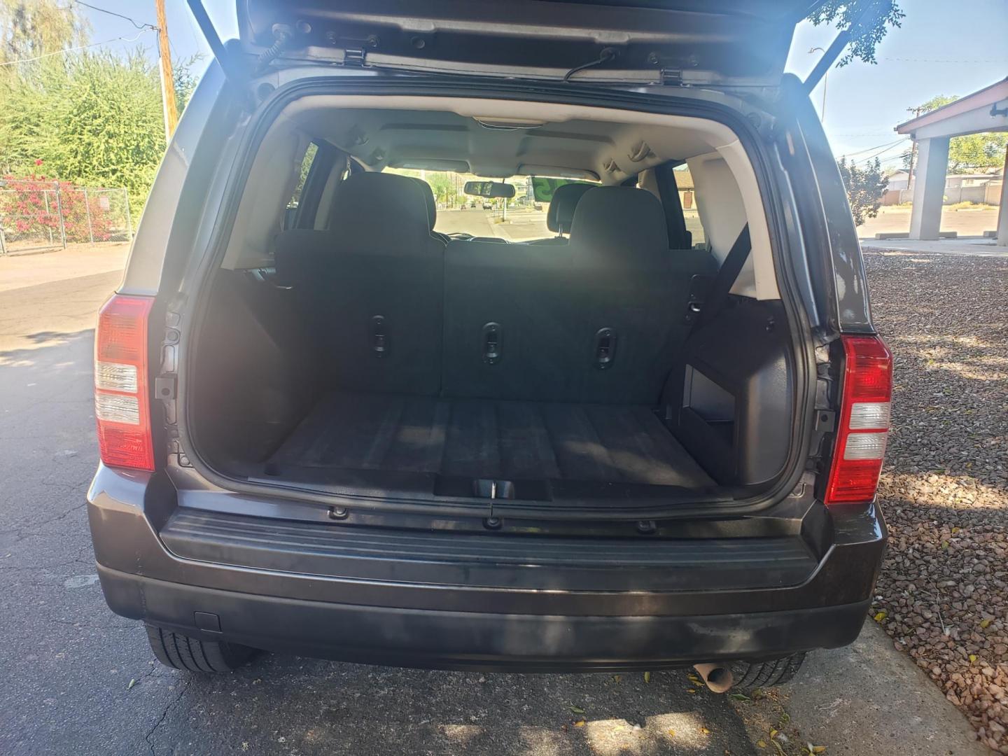 2017 gray /gray and black Jeep Patriot Sport 2WD (1C4NJPBA1HD) with an 2.0L L4 DOHC 16V engine, automatic transmission, located at 323 E Dunlap Ave., Phoenix, AZ, 85020, (602) 331-9000, 33.567677, -112.069000 - 2017 Jeep Patriot Sport 2WD,…….Ice Cold A/C, Clean gray and black interior with gray cloth seats in good condition, New brakes, Tune up, Stereo/CD Player, Bluetooth, Phone sync, Satellite compatible, This SUV is gorgeous inside and out, Incredible gas mileage! Arizona title , Runs and Drives E - Photo#16