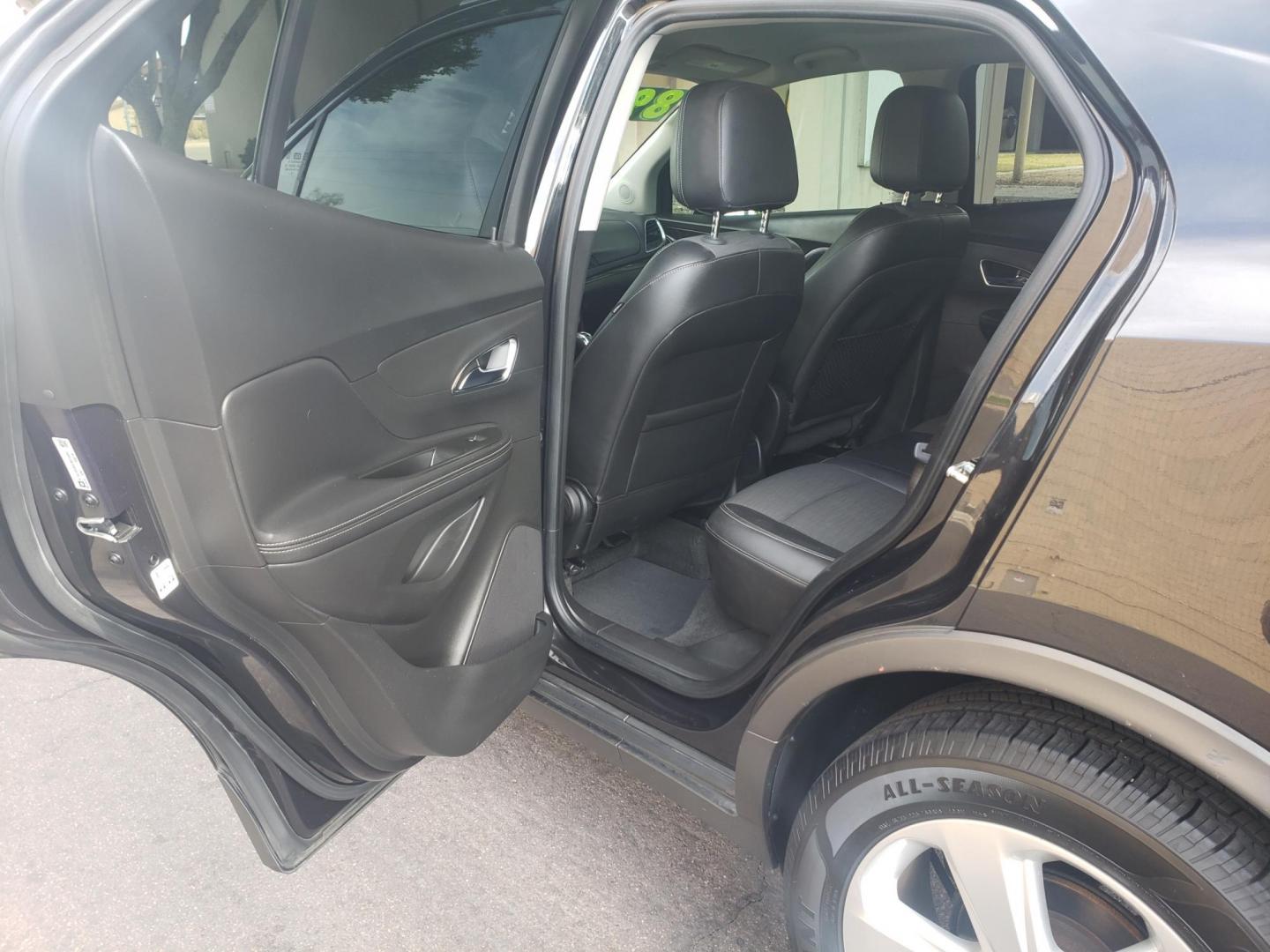 2015 black /gray and black Buick Encore Convenience FWD (KL4CJBSB9FB) with an 1.4L L4 DOHC 16V TURBO engine, 6-Speed Automatic transmission, located at 323 E Dunlap Ave., Phoenix, AZ, 85020, (602) 331-9000, 33.567677, -112.069000 - 2015 Buick Encore Convenience FWD,....EXCELLENT condition, Ice Cold A/C, Black and gray interior with black leather seats in near perfect condition, New brakes, Tune up, Stereo/CD Player, Bluetooth, Phone sync, backup camera, satellite compatible, This suv is gorgeous inside and out, Incredible ga - Photo#10