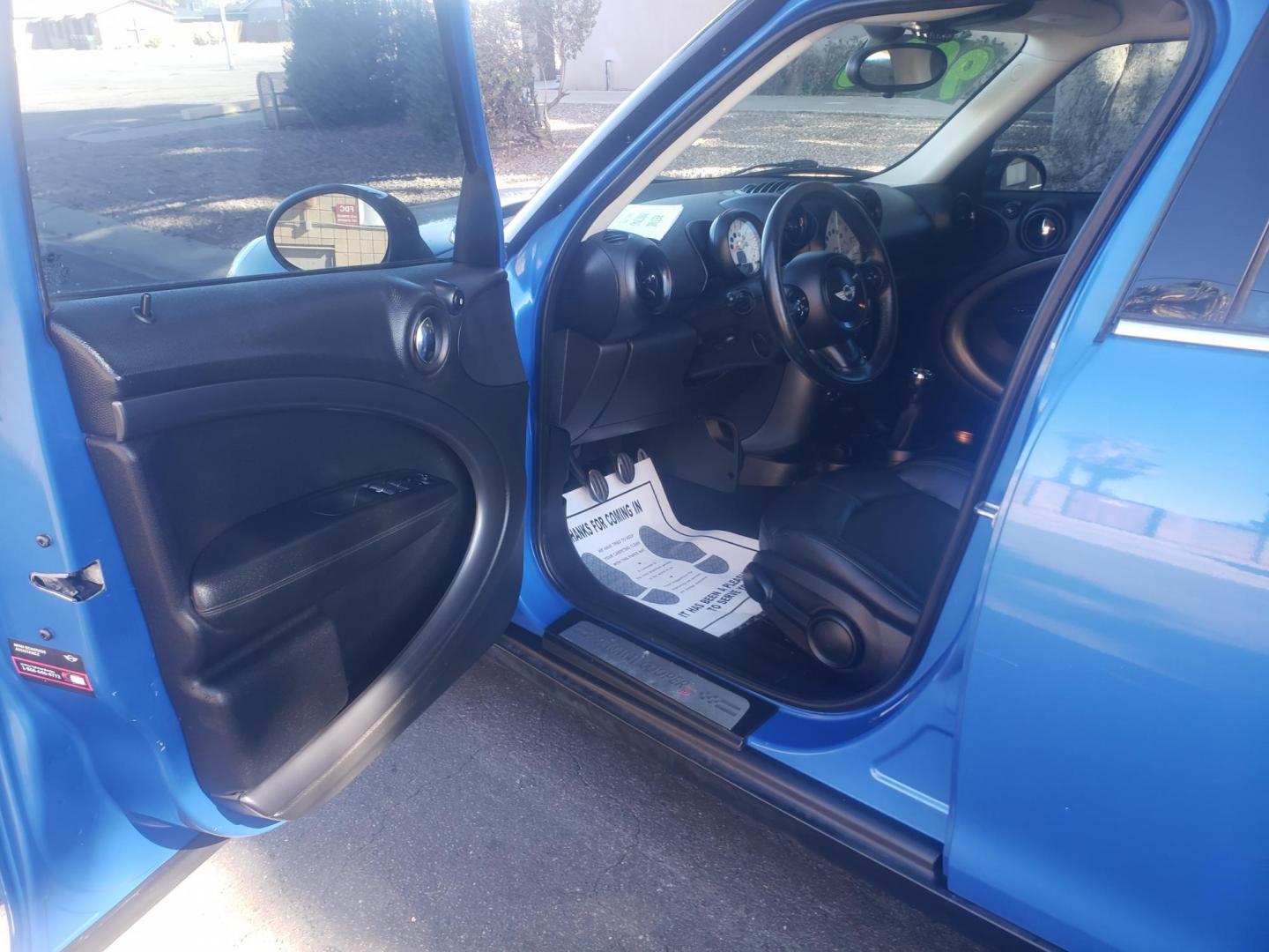 2013 BLUE /gray and black Mini Countryman S ALL4 (WMWZC5C55DW) with an 1.6L L4 DOHC 16V TURBO engine, manuel transmission, located at 323 E Dunlap Ave., Phoenix, AZ, 85020, (602) 331-9000, 33.567677, -112.069000 - 2013 MINI Cooper S,.......EXCELLENT CONDITION........A REAL MUST SEE.....ONLY 105K MILES,....Ice Clod AC...Stereo/CD Player, phone sync, Bluetooth, Gray and black interior with black leather seats in near perfect condition....Runs and Drives Excellent. passed emissions...... Call or text Jody 602-44 - Photo#8