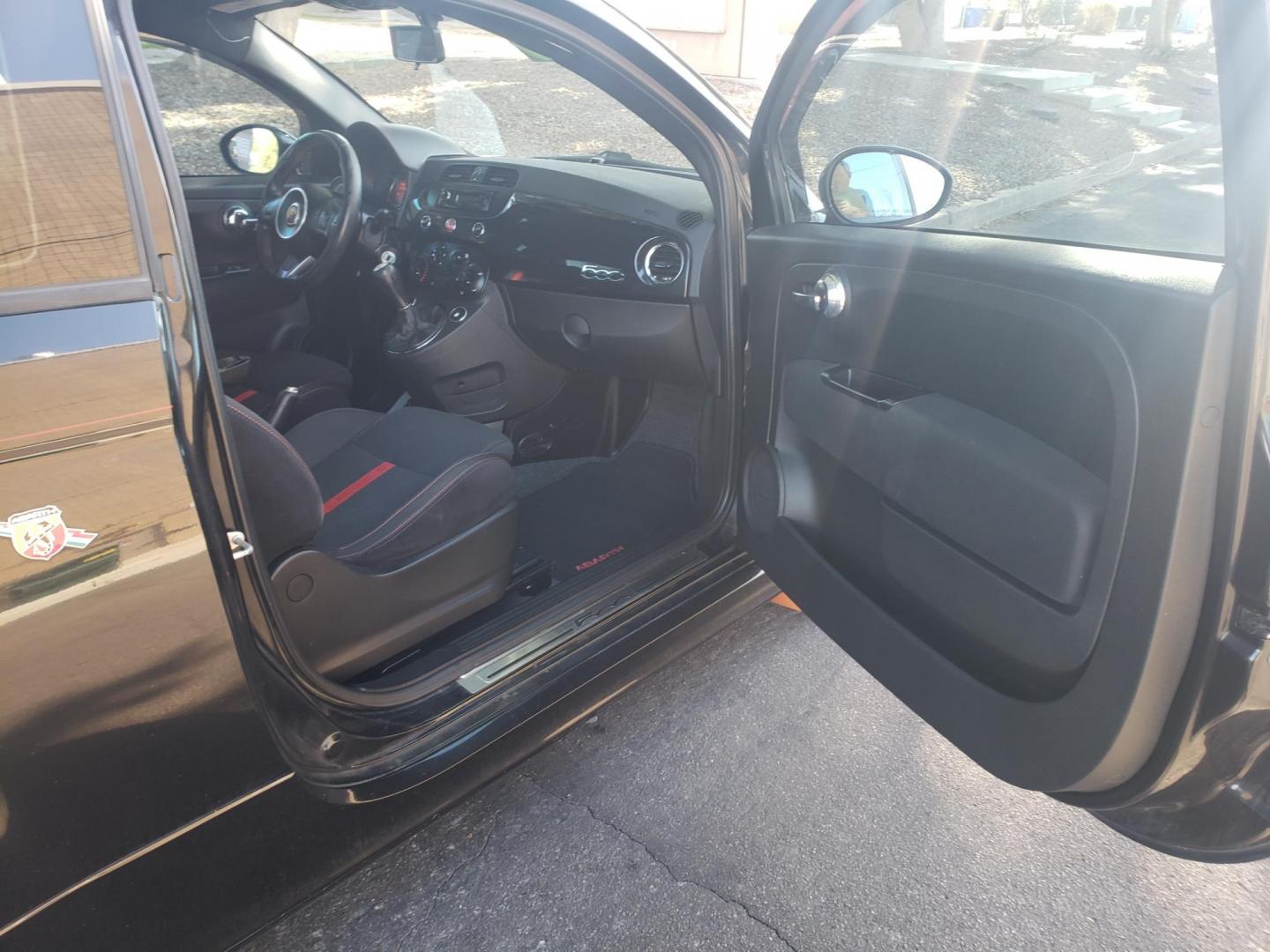 2013 black /black and red Fiat 500 Abarth Hatchback (3C3CFFFH1DT) with an 1.4L L4 engine, 5-Speed Manual transmission, located at 323 E Dunlap Ave., Phoenix, AZ, 85020, (602) 331-9000, 33.567677, -112.069000 - 2013 Fiat 500 Abarth Hatchback,........EXCELLENT condition, A Real Must See!!.... ONLY 129K miles..... Ice cold A/C, No accidents, Power everything, Kenwood Stereo/cd player, Phone sync, Bluetooth, Clean black and red interior with black and red cloth seats in near perfect condition, power windows, - Photo#11