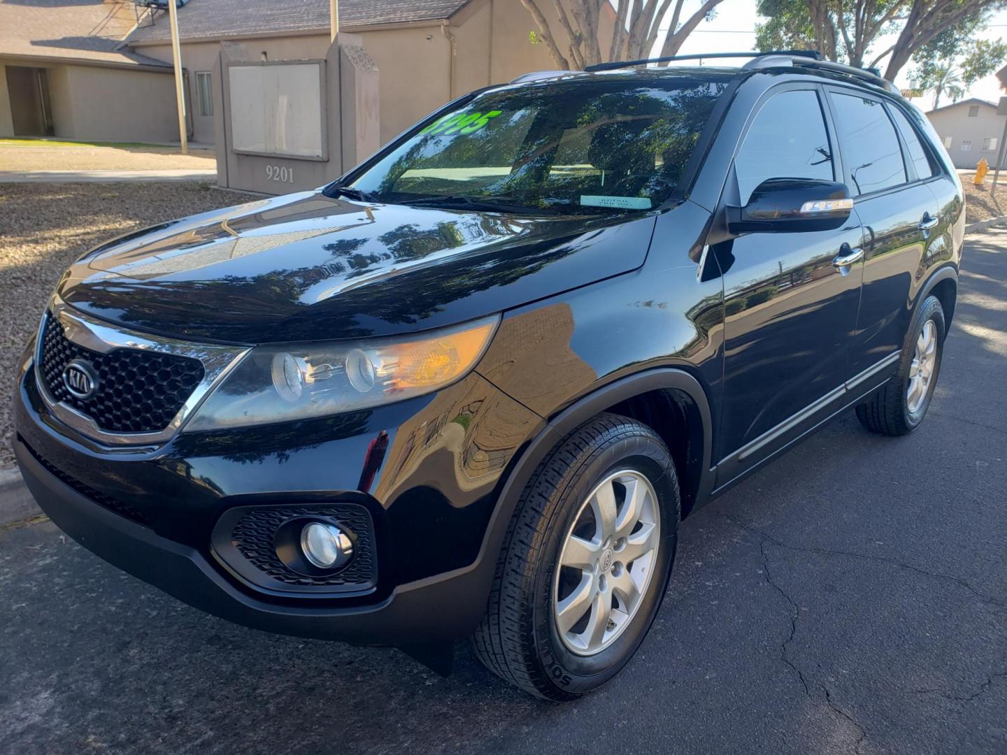 2012 black /gray and black Kia Sorento LX 2WD (5XYKT4A2XCG) with an 3.5L V6 DOHC 24V engine, 6-Speed Automatic transmission, located at 323 E Dunlap Ave., Phoenix, AZ, 85020, (602) 331-9000, 33.567677, -112.069000 - Photo#0