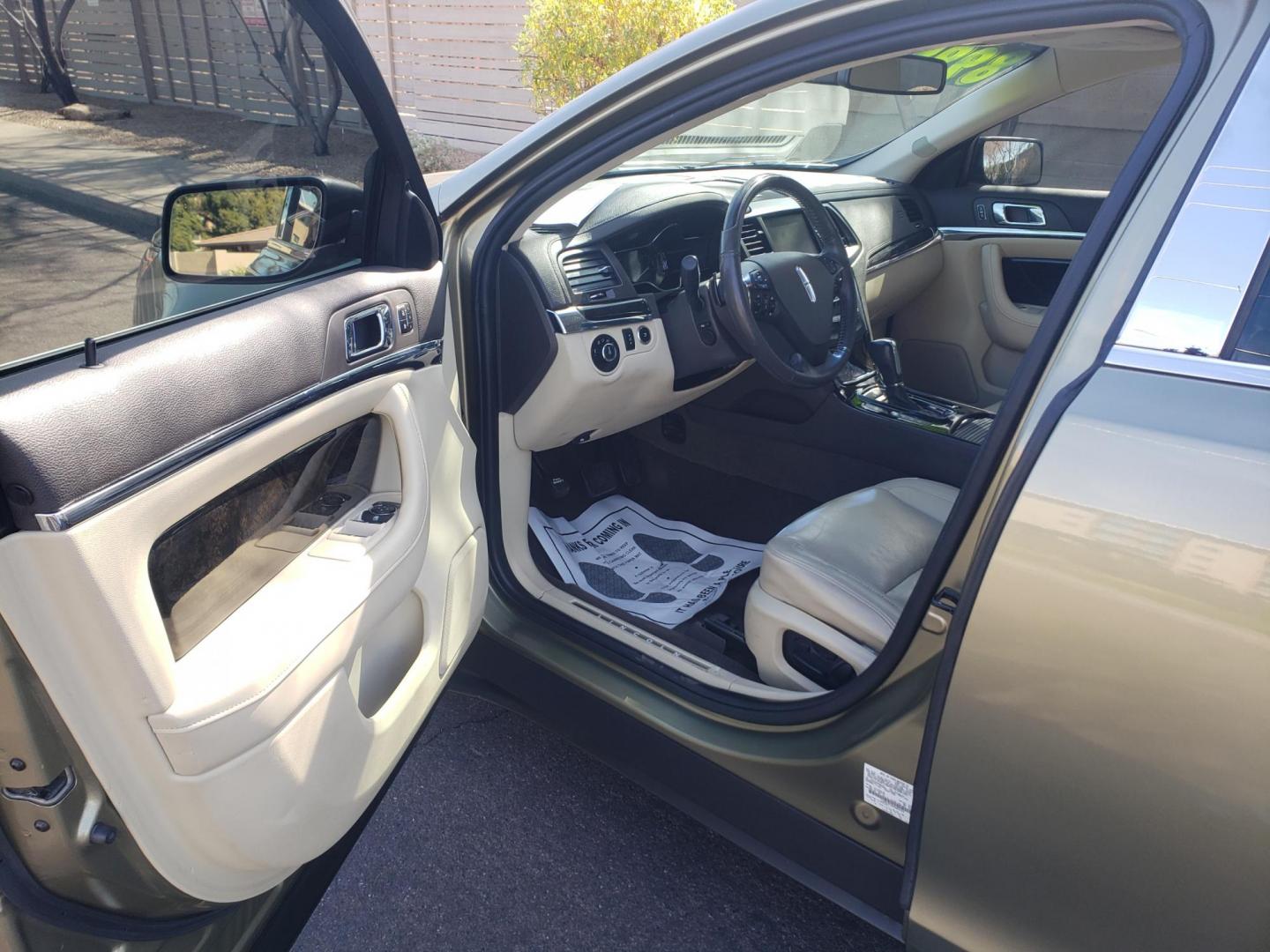 2013 gold /Tan and black Lincoln MKS EcoBoost AWD (1LNHL9FT6DG) with an 3.5L V6 DOHC 24V engine, 6-Speed Automatic transmission, located at 323 E Dunlap Ave., Phoenix, AZ, 85020, (602) 331-9000, 33.567677, -112.069000 - 2013 Lincoln MKS EcoBoost AWD,......A True Must See!! No accidents, IceCold AC, The car is gorgeous inside and out, power windows, power door locks, Gorgeous tinted sunroof, touch screen Stereo/Cd Player, Navigation, Phone sync, Bluetooth, Satellite radio compatible, Backup camera, Clean tan and gra - Photo#8