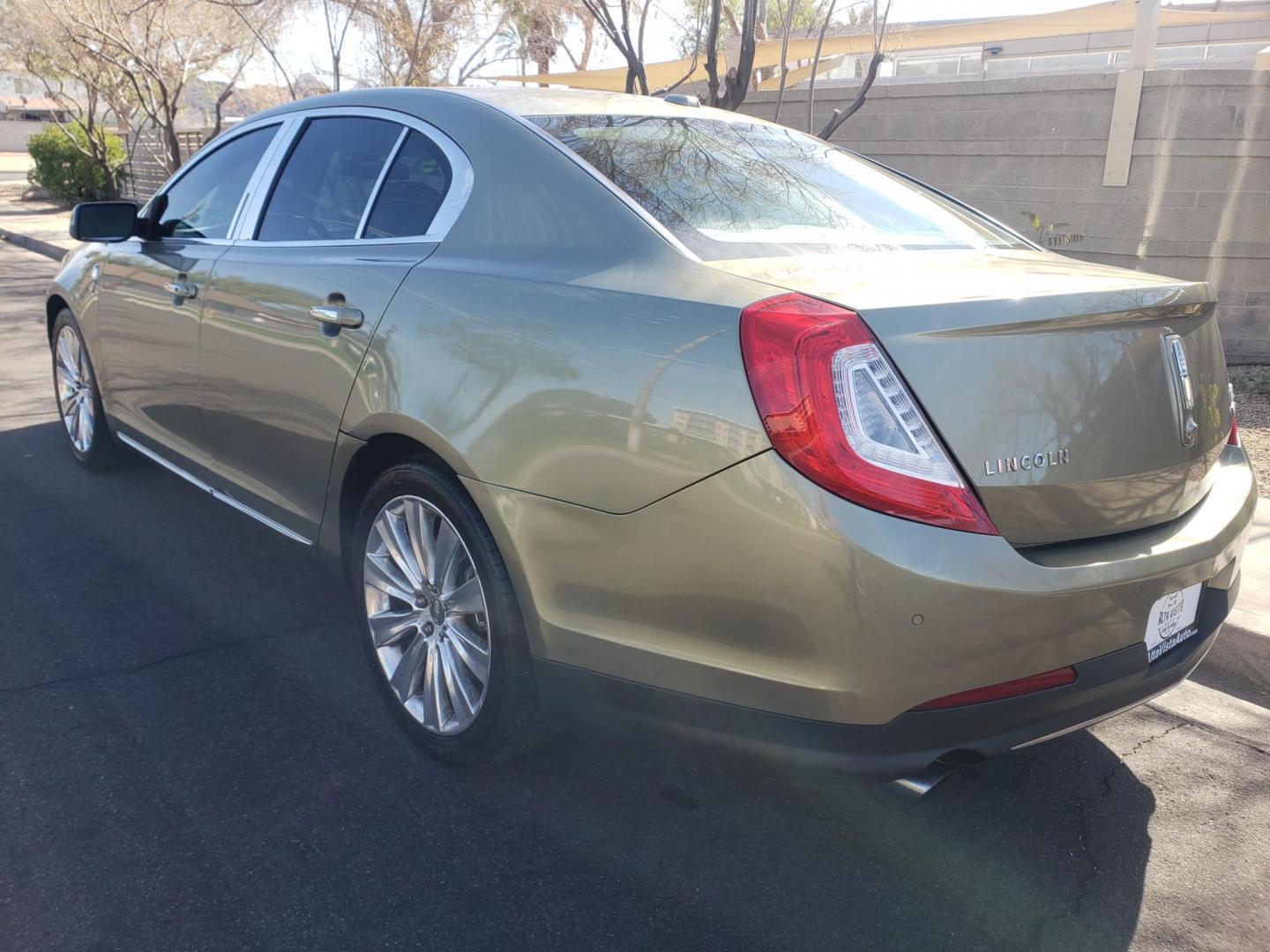 2013 gold /Tan and black Lincoln MKS EcoBoost AWD (1LNHL9FT6DG) with an 3.5L V6 DOHC 24V engine, 6-Speed Automatic transmission, located at 323 E Dunlap Ave., Phoenix, AZ, 85020, (602) 331-9000, 33.567677, -112.069000 - 2013 Lincoln MKS EcoBoost AWD,......A True Must See!! No accidents, IceCold AC, The car is gorgeous inside and out, power windows, power door locks, Gorgeous tinted sunroof, touch screen Stereo/Cd Player, Navigation, Phone sync, Bluetooth, Satellite radio compatible, Backup camera, Clean tan and gra - Photo#5
