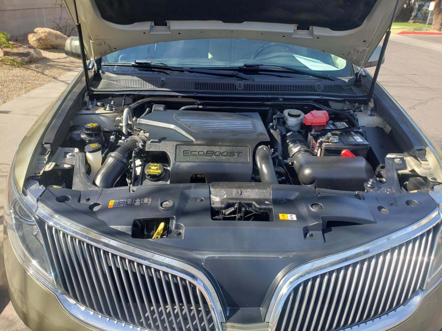 2013 gold /Tan and black Lincoln MKS EcoBoost AWD (1LNHL9FT6DG) with an 3.5L V6 DOHC 24V engine, 6-Speed Automatic transmission, located at 323 E Dunlap Ave., Phoenix, AZ, 85020, (602) 331-9000, 33.567677, -112.069000 - 2013 Lincoln MKS EcoBoost AWD,......A True Must See!! No accidents, IceCold AC, The car is gorgeous inside and out, power windows, power door locks, Gorgeous tinted sunroof, touch screen Stereo/Cd Player, Navigation, Phone sync, Bluetooth, Satellite radio compatible, Backup camera, Clean tan and gra - Photo#19