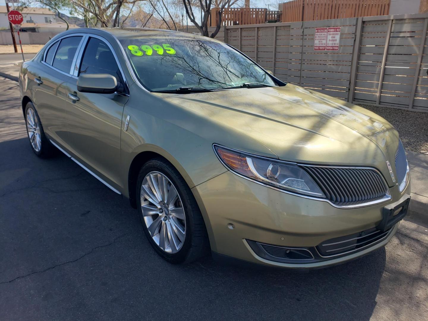 2013 gold /Tan and black Lincoln MKS EcoBoost AWD (1LNHL9FT6DG) with an 3.5L V6 DOHC 24V engine, 6-Speed Automatic transmission, located at 323 E Dunlap Ave., Phoenix, AZ, 85020, (602) 331-9000, 33.567677, -112.069000 - 2013 Lincoln MKS EcoBoost AWD,......A True Must See!! No accidents, IceCold AC, The car is gorgeous inside and out, power windows, power door locks, Gorgeous tinted sunroof, touch screen Stereo/Cd Player, Navigation, Phone sync, Bluetooth, Satellite radio compatible, Backup camera, Clean tan and gra - Photo#2