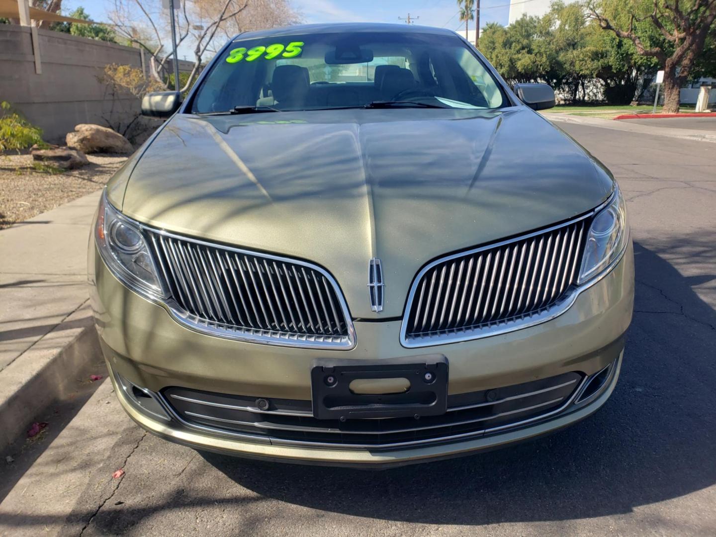 2013 gold /Tan and black Lincoln MKS EcoBoost AWD (1LNHL9FT6DG) with an 3.5L V6 DOHC 24V engine, 6-Speed Automatic transmission, located at 323 E Dunlap Ave., Phoenix, AZ, 85020, (602) 331-9000, 33.567677, -112.069000 - 2013 Lincoln MKS EcoBoost AWD,......A True Must See!! No accidents, IceCold AC, The car is gorgeous inside and out, power windows, power door locks, Gorgeous tinted sunroof, touch screen Stereo/Cd Player, Navigation, Phone sync, Bluetooth, Satellite radio compatible, Backup camera, Clean tan and gra - Photo#1
