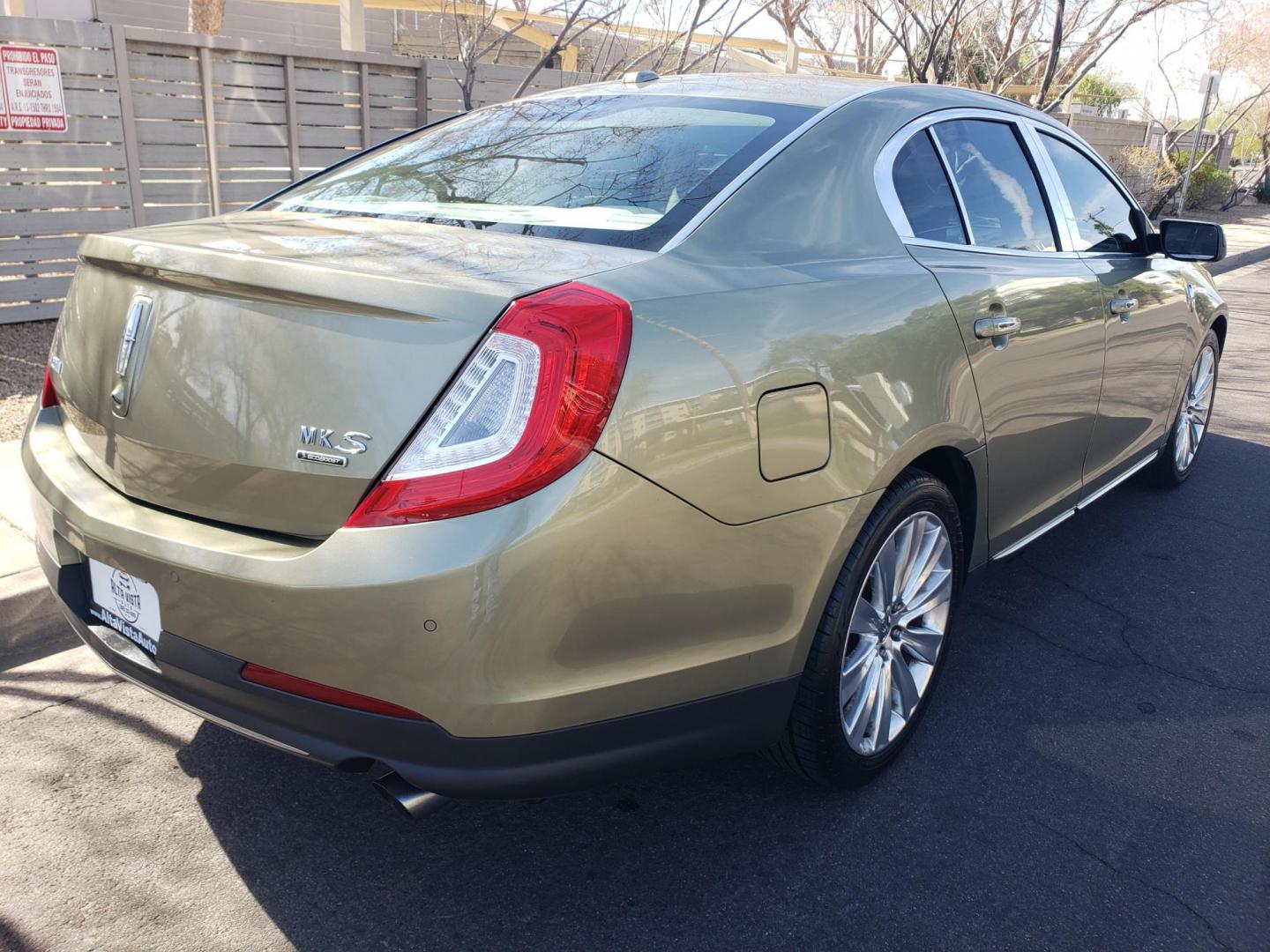 2013 gold /Tan and black Lincoln MKS EcoBoost AWD (1LNHL9FT6DG) with an 3.5L V6 DOHC 24V engine, 6-Speed Automatic transmission, located at 323 E Dunlap Ave., Phoenix, AZ, 85020, (602) 331-9000, 33.567677, -112.069000 - 2013 Lincoln MKS EcoBoost AWD,......A True Must See!! No accidents, IceCold AC, The car is gorgeous inside and out, power windows, power door locks, Gorgeous tinted sunroof, touch screen Stereo/Cd Player, Navigation, Phone sync, Bluetooth, Satellite radio compatible, Backup camera, Clean tan and gra - Photo#3