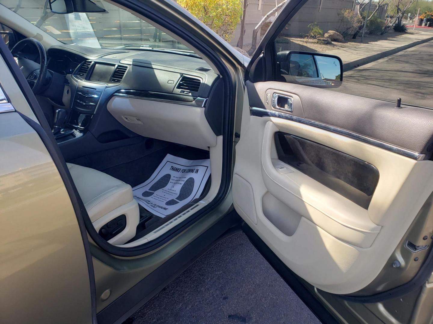 2013 gold /Tan and black Lincoln MKS EcoBoost AWD (1LNHL9FT6DG) with an 3.5L V6 DOHC 24V engine, 6-Speed Automatic transmission, located at 323 E Dunlap Ave., Phoenix, AZ, 85020, (602) 331-9000, 33.567677, -112.069000 - 2013 Lincoln MKS EcoBoost AWD,......A True Must See!! No accidents, IceCold AC, The car is gorgeous inside and out, power windows, power door locks, Gorgeous tinted sunroof, touch screen Stereo/Cd Player, Navigation, Phone sync, Bluetooth, Satellite radio compatible, Backup camera, Clean tan and gra - Photo#12