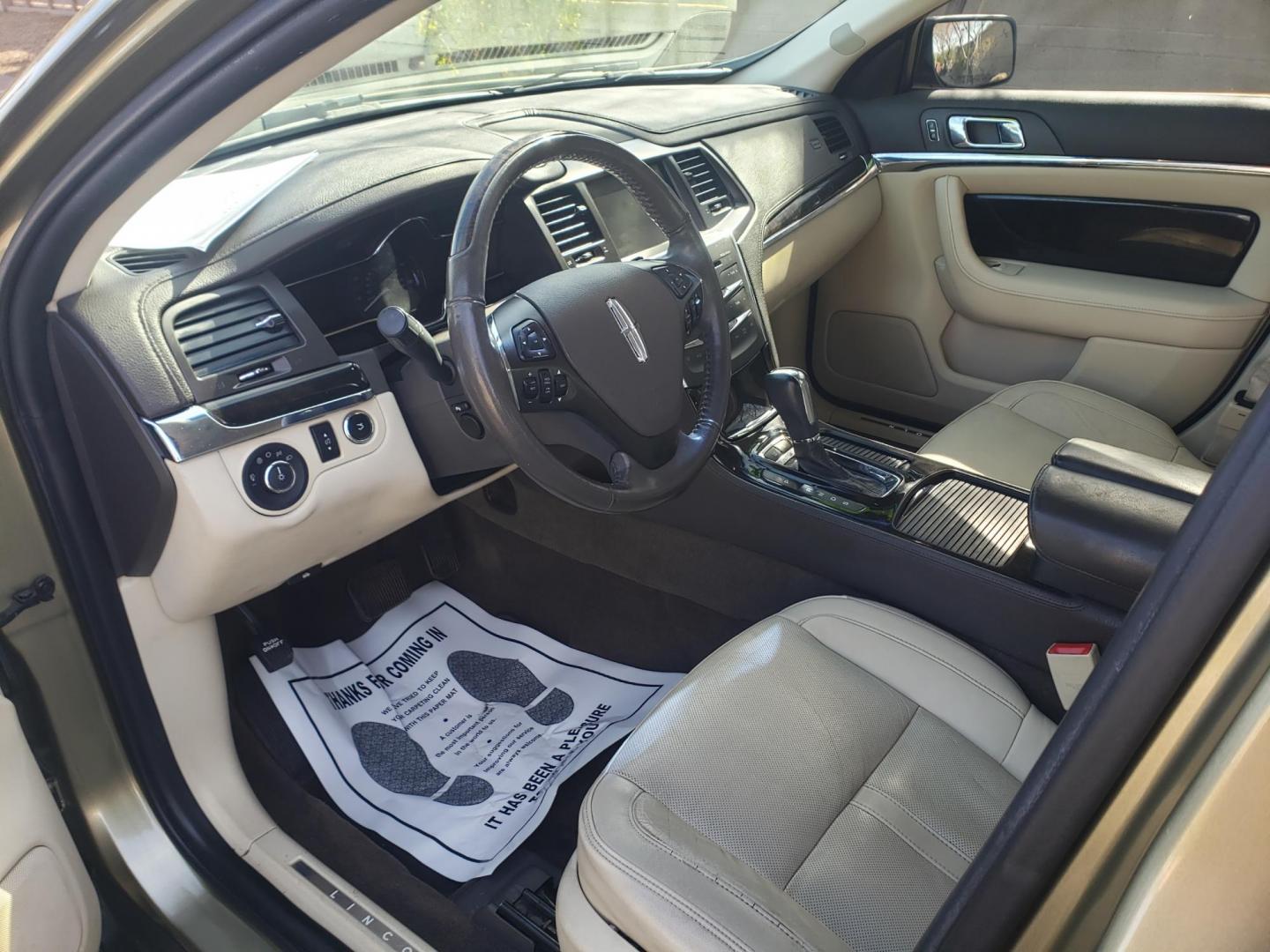 2013 gold /Tan and black Lincoln MKS EcoBoost AWD (1LNHL9FT6DG) with an 3.5L V6 DOHC 24V engine, 6-Speed Automatic transmission, located at 323 E Dunlap Ave., Phoenix, AZ, 85020, (602) 331-9000, 33.567677, -112.069000 - 2013 Lincoln MKS EcoBoost AWD,......A True Must See!! No accidents, IceCold AC, The car is gorgeous inside and out, power windows, power door locks, Gorgeous tinted sunroof, touch screen Stereo/Cd Player, Navigation, Phone sync, Bluetooth, Satellite radio compatible, Backup camera, Clean tan and gra - Photo#9