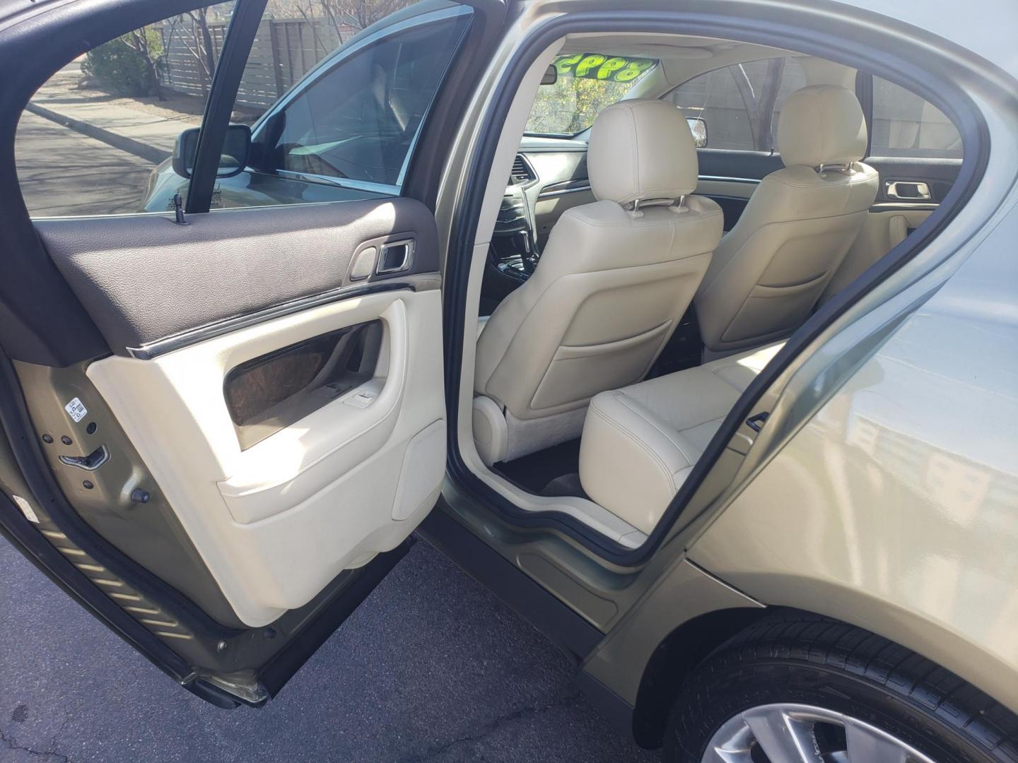 2013 gold /Tan and black Lincoln MKS EcoBoost AWD (1LNHL9FT6DG) with an 3.5L V6 DOHC 24V engine, 6-Speed Automatic transmission, located at 323 E Dunlap Ave., Phoenix, AZ, 85020, (602) 331-9000, 33.567677, -112.069000 - 2013 Lincoln MKS EcoBoost AWD,......A True Must See!! No accidents, IceCold AC, The car is gorgeous inside and out, power windows, power door locks, Gorgeous tinted sunroof, touch screen Stereo/Cd Player, Navigation, Phone sync, Bluetooth, Satellite radio compatible, Backup camera, Clean tan and gra - Photo#10