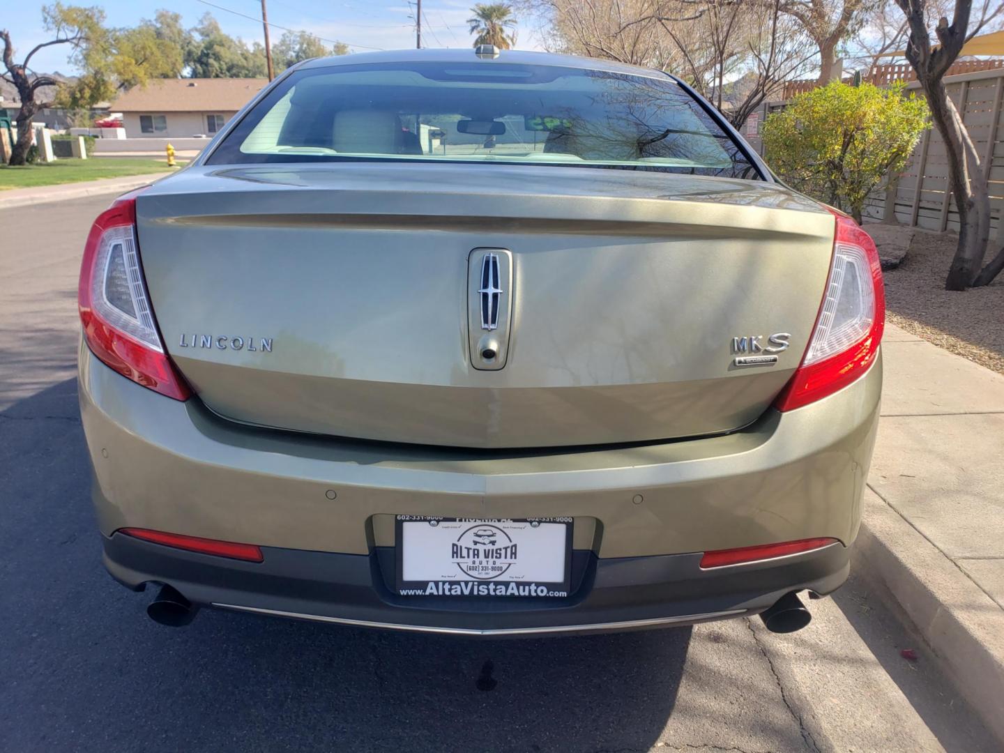 2013 gold /Tan and black Lincoln MKS EcoBoost AWD (1LNHL9FT6DG) with an 3.5L V6 DOHC 24V engine, 6-Speed Automatic transmission, located at 323 E Dunlap Ave., Phoenix, AZ, 85020, (602) 331-9000, 33.567677, -112.069000 - 2013 Lincoln MKS EcoBoost AWD,......A True Must See!! No accidents, IceCold AC, The car is gorgeous inside and out, power windows, power door locks, Gorgeous tinted sunroof, touch screen Stereo/Cd Player, Navigation, Phone sync, Bluetooth, Satellite radio compatible, Backup camera, Clean tan and gra - Photo#7