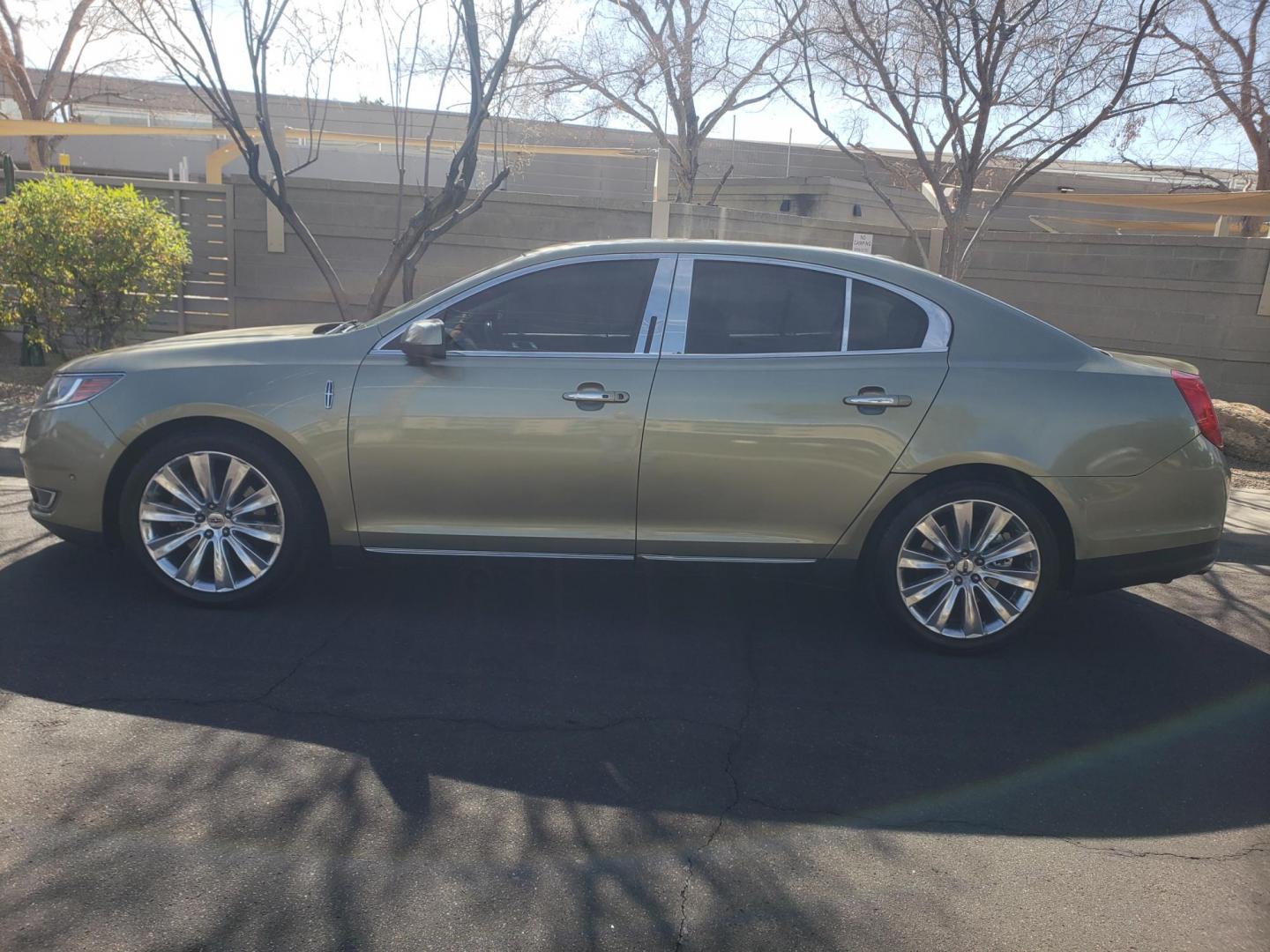 2013 gold /Tan and black Lincoln MKS EcoBoost AWD (1LNHL9FT6DG) with an 3.5L V6 DOHC 24V engine, 6-Speed Automatic transmission, located at 323 E Dunlap Ave., Phoenix, AZ, 85020, (602) 331-9000, 33.567677, -112.069000 - 2013 Lincoln MKS EcoBoost AWD,......A True Must See!! No accidents, IceCold AC, The car is gorgeous inside and out, power windows, power door locks, Gorgeous tinted sunroof, touch screen Stereo/Cd Player, Navigation, Phone sync, Bluetooth, Satellite radio compatible, Backup camera, Clean tan and gra - Photo#6