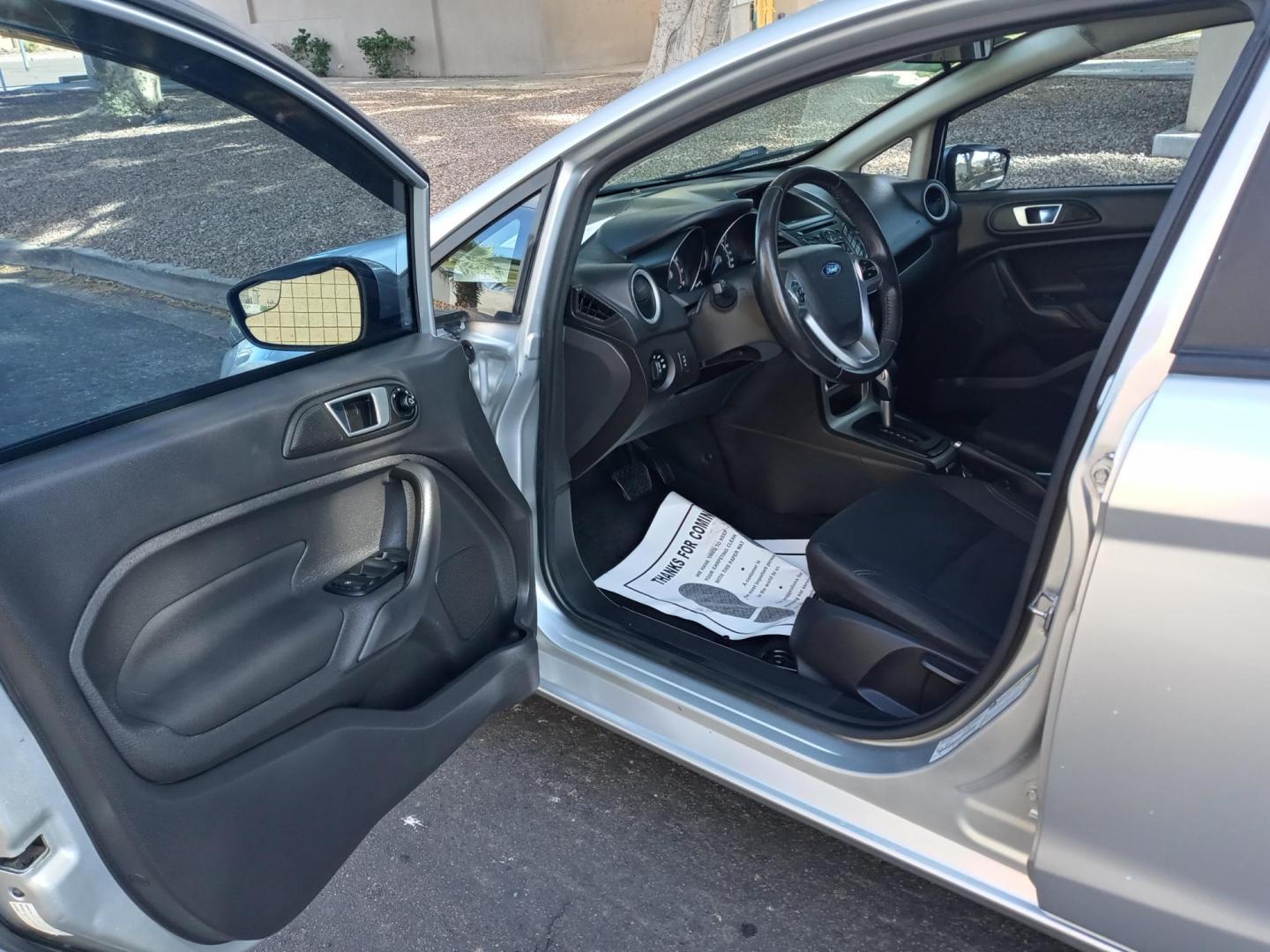 2016 silver /gray and black Ford Fiesta SE Hatchback (3FADP4EJ8GM) with an 1.6L L4 DOHC 16V engine, automatic transmission, located at 323 E Dunlap Ave., Phoenix, AZ, 85020, (602) 331-9000, 33.567677, -112.069000 - 2016 Ford Fiesta SE Hatchback,...... EXCELLENT condition, A Real Must See!!.... No accidents, Ice cold ac, Stereo/CD Player, Bluetooth, Phone sync, Clean Black and gray interior with Black cloth seats in near perfect condition, power windows, power door locks, clean Arizona title, Runs and Drives E - Photo#7