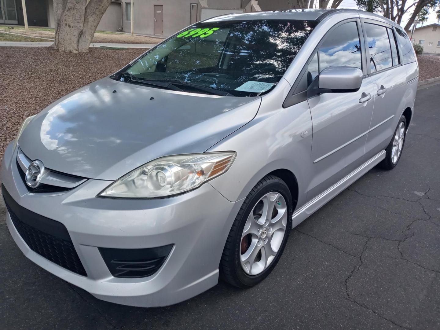 2008 silver /gray and black Mazda MAZDA5 Grand Touring (JM1CR293080) with an 2.3L L4 DOHC 16V engine, 5-Speed Automatic transmission, located at 323 E Dunlap Ave., Phoenix, AZ, 85020, (602) 331-9000, 33.567677, -112.069000 - 2008 Mazda MAZDA5 Grand Touring,.......EXCELLENT condition,........ Ice Cold A/C, Clean black and gray interior with black cloth seats in near perfect condition, New brakes, Tune up, Stereo/CD Player, Bluetooth, Phone sync, Satellite compatible, 3RD Row seating, Rear A/C, Gorgeous tinted sunroof, Th - Photo#0