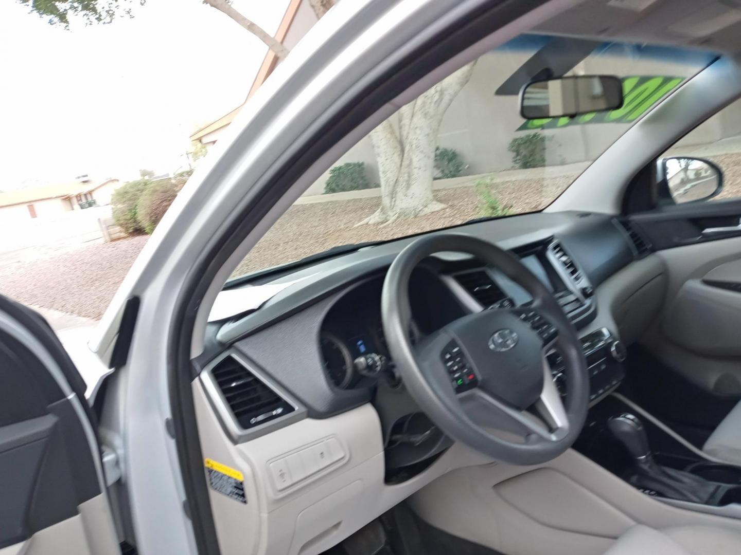 2018 silver /gray and black Hyundai Tucson SE AWD (KM8J3CA43JU) with an 2.0L L4 DOHC 16V engine, 6A transmission, located at 323 E Dunlap Ave., Phoenix, AZ, 85020, (602) 331-9000, 33.567677, -112.069000 - 2018 Hyundai Tucson SE AWD,.......EXCELLENT condition, ONLY 128K MILES!!.... Ice Cold A/C Front and Rear, Black and gray interior with gray cloth seats in near perfect condition, New Tires, New brakes, Tune up, Touch screen Stereo/CD Player, Bluetooth, Phone sync, Satellite compatible, This suv is - Photo#9