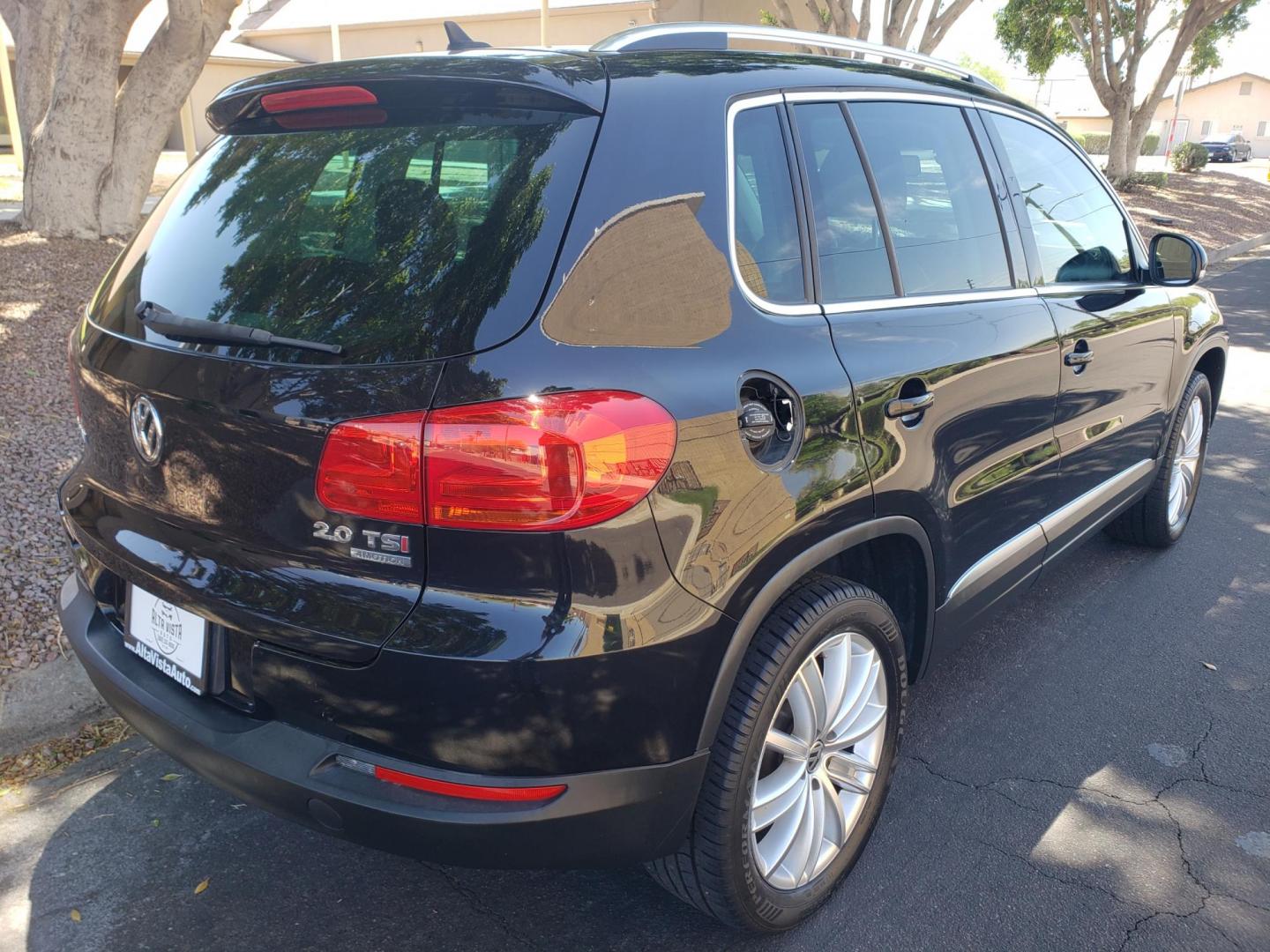2015 black /gray and black Volkswagen Tiguan S 4Motion (WVGBV7AX9FW) with an 2.0L L4 DOHC 16V TURBO engine, 6-Speed Automatic transmission, located at 323 E Dunlap Ave., Phoenix, AZ, 85020, (602) 331-9000, 33.567677, -112.069000 - 2015 Volkswagen Tiguan S 4Motion,.......EXCELLENT condition,.... Ice Cold A/C, Black and gray interior with black leather seats in near perfect condition, Stereo/CD Player, Bluetooth, Phone sync, Backup camera, Satellite compatible, Navigation, Gorgeous tinted sunroof, This suv is gorgeous inside an - Photo#3