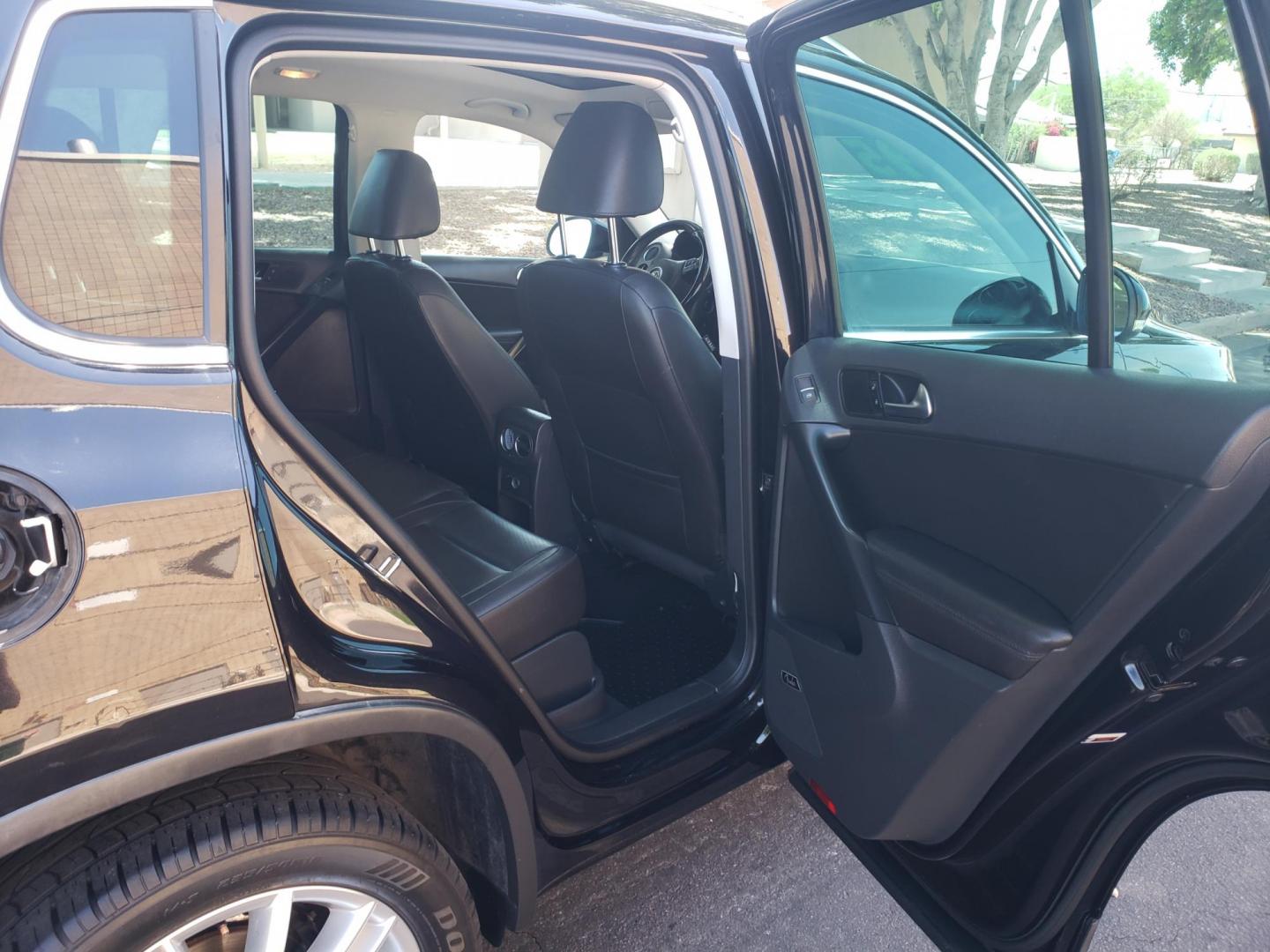 2015 black /gray and black Volkswagen Tiguan S 4Motion (WVGBV7AX9FW) with an 2.0L L4 DOHC 16V TURBO engine, 6-Speed Automatic transmission, located at 323 E Dunlap Ave., Phoenix, AZ, 85020, (602) 331-9000, 33.567677, -112.069000 - 2015 Volkswagen Tiguan S 4Motion,.......EXCELLENT condition,.... Ice Cold A/C, Black and gray interior with black leather seats in near perfect condition, Stereo/CD Player, Bluetooth, Phone sync, Backup camera, Satellite compatible, Navigation, Gorgeous tinted sunroof, This suv is gorgeous inside an - Photo#14
