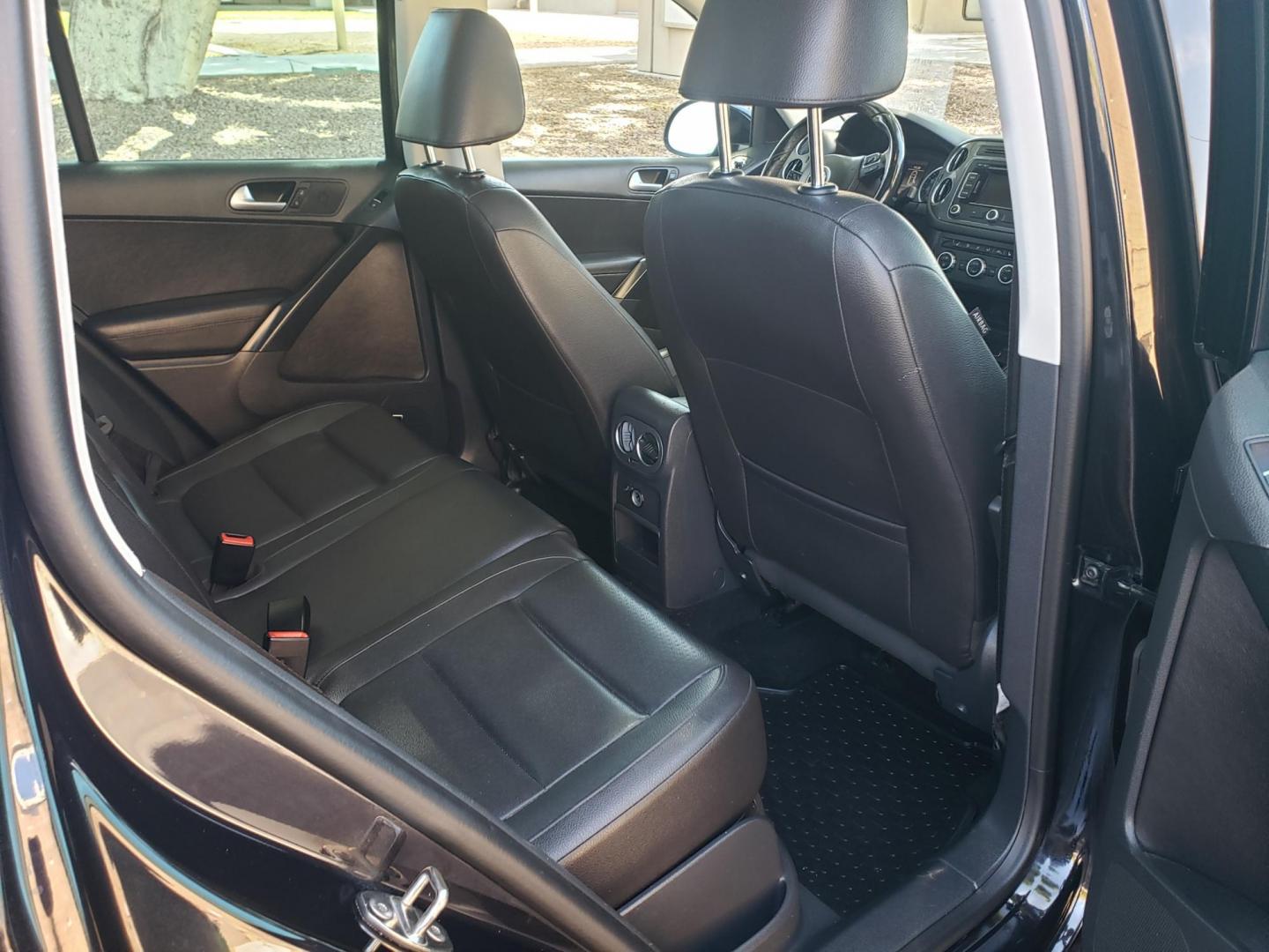2015 black /gray and black Volkswagen Tiguan S 4Motion (WVGBV7AX9FW) with an 2.0L L4 DOHC 16V TURBO engine, 6-Speed Automatic transmission, located at 323 E Dunlap Ave., Phoenix, AZ, 85020, (602) 331-9000, 33.567677, -112.069000 - 2015 Volkswagen Tiguan S 4Motion,.......EXCELLENT condition,.... Ice Cold A/C, Black and gray interior with black leather seats in near perfect condition, Stereo/CD Player, Bluetooth, Phone sync, Backup camera, Satellite compatible, Navigation, Gorgeous tinted sunroof, This suv is gorgeous inside an - Photo#15