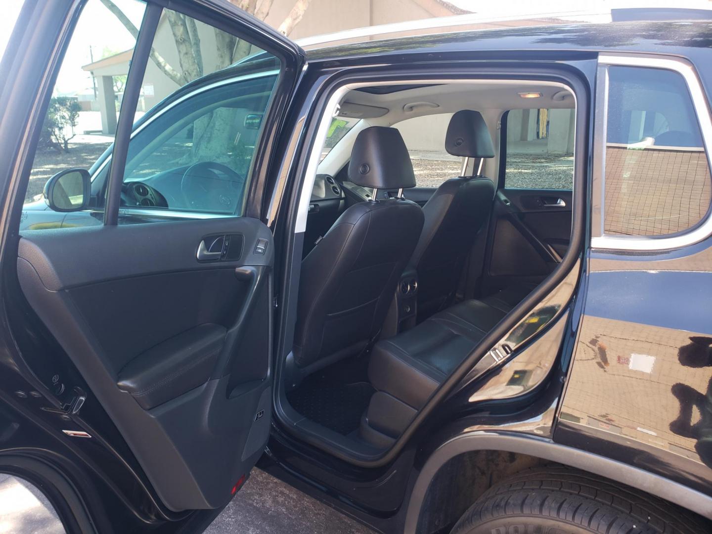 2015 black /gray and black Volkswagen Tiguan S 4Motion (WVGBV7AX9FW) with an 2.0L L4 DOHC 16V TURBO engine, 6-Speed Automatic transmission, located at 323 E Dunlap Ave., Phoenix, AZ, 85020, (602) 331-9000, 33.567677, -112.069000 - 2015 Volkswagen Tiguan S 4Motion,.......EXCELLENT condition,.... Ice Cold A/C, Black and gray interior with black leather seats in near perfect condition, Stereo/CD Player, Bluetooth, Phone sync, Backup camera, Satellite compatible, Navigation, Gorgeous tinted sunroof, This suv is gorgeous inside an - Photo#10