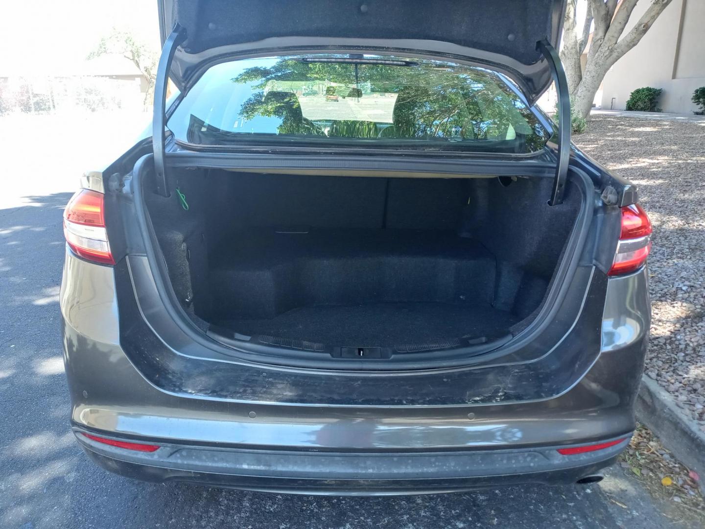 2017 gray /black Ford Fusion Hybrid SE (3FA6P0LU0HR) with an 2.0L L4 DOHC 16V HYBRID engine, CVT transmission, located at 323 E Dunlap Ave., Phoenix, AZ, 85020, (602) 331-9000, 33.567677, -112.069000 - 2017 Ford Fusion Hybrid SE,........EXCELLENT condition, A Real Must See!!.... No accidents, Power everything, Touch screen Stereo/cd player, Phone sync, Bluetooth, Satellite compatible, backup camera, navigation, Ice cold ac, Clean Black interior with black leather seats in near perfect condition, p - Photo#16