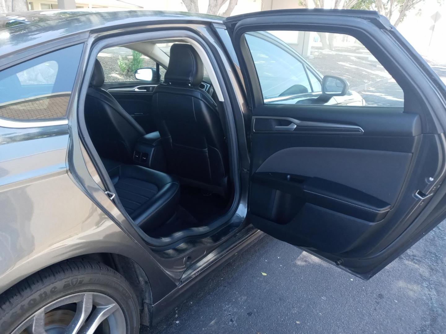 2017 gray /black Ford Fusion Hybrid SE (3FA6P0LU0HR) with an 2.0L L4 DOHC 16V HYBRID engine, CVT transmission, located at 323 E Dunlap Ave., Phoenix, AZ, 85020, (602) 331-9000, 33.567677, -112.069000 - 2017 Ford Fusion Hybrid SE,........EXCELLENT condition, A Real Must See!!.... No accidents, Power everything, Touch screen Stereo/cd player, Phone sync, Bluetooth, Satellite compatible, backup camera, navigation, Ice cold ac, Clean Black interior with black leather seats in near perfect condition, p - Photo#14