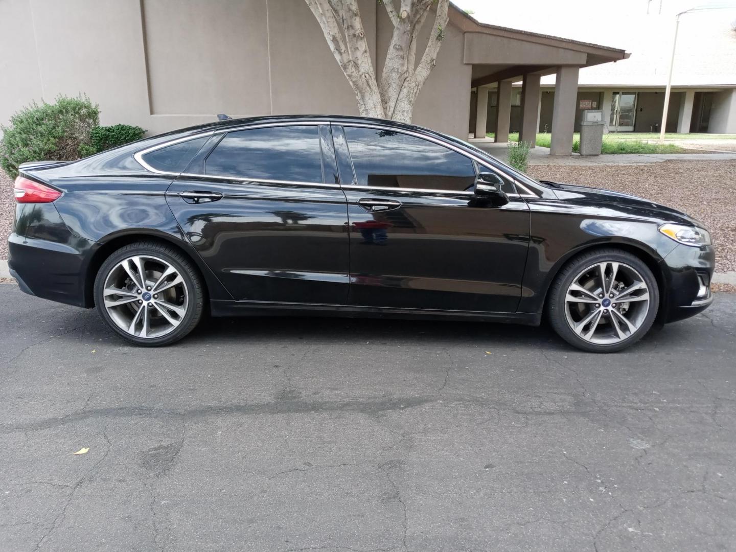 2020 black /black Ford Fusion Titanium AWD (3FA6P0D96LR) with an 2.0L L4 DOHC 16V engine, 6A transmission, located at 323 E Dunlap Ave., Phoenix, AZ, 85020, (602) 331-9000, 33.567677, -112.069000 - 2020 Ford Fusion Titanium AWD,........EXCELLENT condition, A Real Must See!!.... No accidents, Power everything, Touch screen Stereo/cd player, Phone sync, Bluetooth, Satellite compatible, Navigation, Backup camera, Ice cold ac, Clean Black interior with Black leather seats in near perfect condition - Photo#4