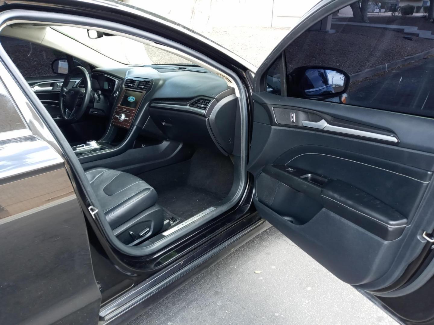 2020 black /black Ford Fusion Titanium AWD (3FA6P0D96LR) with an 2.0L L4 DOHC 16V engine, 6A transmission, located at 323 E Dunlap Ave., Phoenix, AZ, 85020, (602) 331-9000, 33.567677, -112.069000 - 2020 Ford Fusion Titanium AWD,........EXCELLENT condition, A Real Must See!!.... No accidents, Power everything, Touch screen Stereo/cd player, Phone sync, Bluetooth, Satellite compatible, Navigation, Backup camera, Ice cold ac, Clean Black interior with Black leather seats in near perfect condition - Photo#12