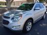 2016 silver /gray and black Chevrolet Equinox LT 2WD (2GNALCEK9G1) with an 2.4L L4 DOHC 16V FFV engine, 6A transmission, located at 323 E Dunlap Ave., Phoenix, AZ, 85020, (602) 331-9000, 33.567677, -112.069000 - 2016 Chevrolet Equinox LT 2WD,.......EXCELLENT condition,.... Ice Cold A/C, Black and gray interior with black cloth seats in near perfect condition, New brakes, Tune up, touch screen Stereo, Bluetooth, Phone sync, Backuup camera, Satellite compatible, This suv is gorgeous inside and out, Incredibl - Photo#0
