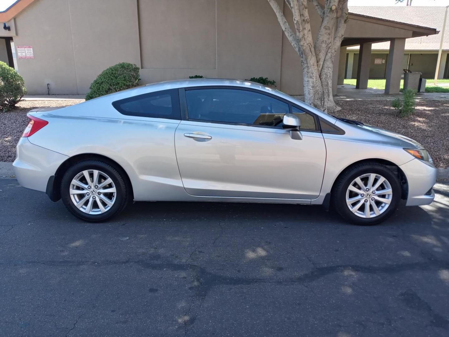 2012 silver /gray Honda Civic LX Coupe 5-Speed AT (2HGFG3B85CH) with an 2.3L L4 SOHC 16V engine, 5-Speed Automatic transmission, located at 323 E Dunlap Ave., Phoenix, AZ, 85020, (602) 331-9000, 33.567677, -112.069000 - Photo#4