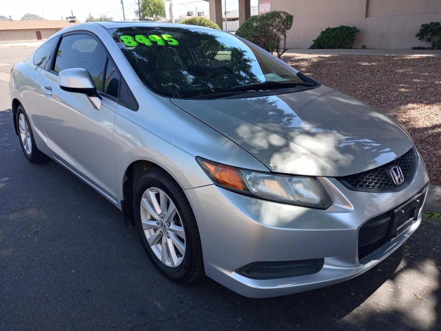2012 silver /gray Honda Civic LX Coupe 5-Speed AT (2HGFG3B85CH) with an 2.3L L4 SOHC 16V engine, 5-Speed Automatic transmission, located at 323 E Dunlap Ave., Phoenix, AZ, 85020, (602) 331-9000, 33.567677, -112.069000 - Photo#2