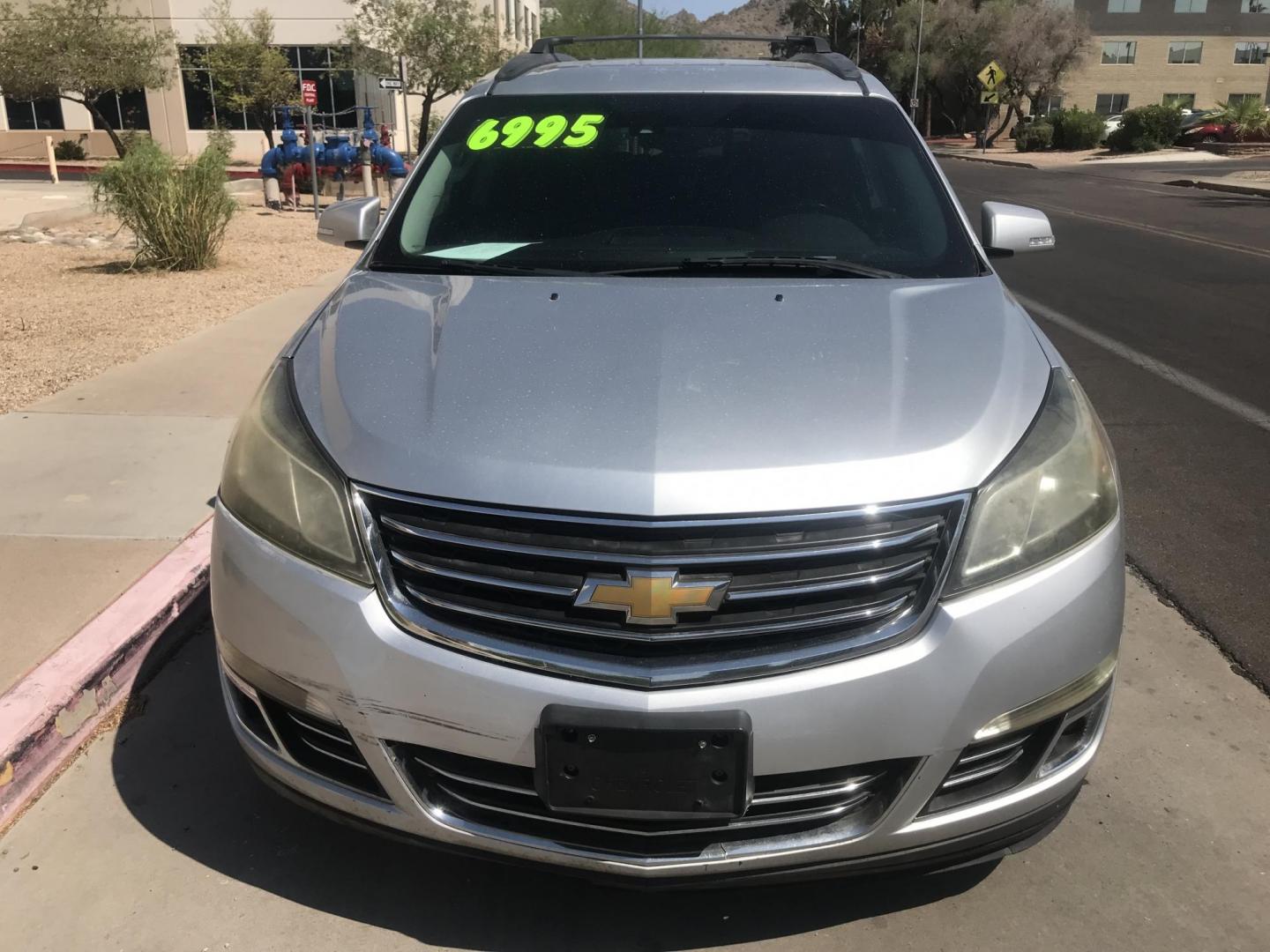 2014 silver /gray and black Chevrolet Traverse LTZ FWD (1GNKRJKD1EJ) with an 3.6L V6 DOHC 24V engine, 6-Speed Automatic transmission, located at 323 E Dunlap Ave., Phoenix, AZ, 85020, (602) 331-9000, 33.567677, -112.069000 - 2014 Chevrolet Traverse LTZ 2WD,........Automatic with 3RD ROW SEATING, Cold A/C, Silver with black leather seats, Touch screen Stereo, Bluetooth, Phone sync, Back-up camera, Satellite compatible, This family suv is in good condition, Clean title , .....passed emissions.....Call or text Dave 602-3 - Photo#3