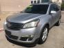 2014 silver /gray and black Chevrolet Traverse LTZ FWD (1GNKRJKD1EJ) with an 3.6L V6 DOHC 24V engine, 6-Speed Automatic transmission, located at 323 E Dunlap Ave., Phoenix, AZ, 85020, (602) 331-9000, 33.567677, -112.069000 - 2014 Chevrolet Traverse LTZ 2WD,........Automatic with 3RD ROW SEATING, Cold A/C, Silver with black leather seats, Touch screen Stereo, Bluetooth, Phone sync, Back-up camera, Satellite compatible, This family suv is in good condition, Clean title , .....passed emissions.....Call or text Dave 602-3 - Photo#0