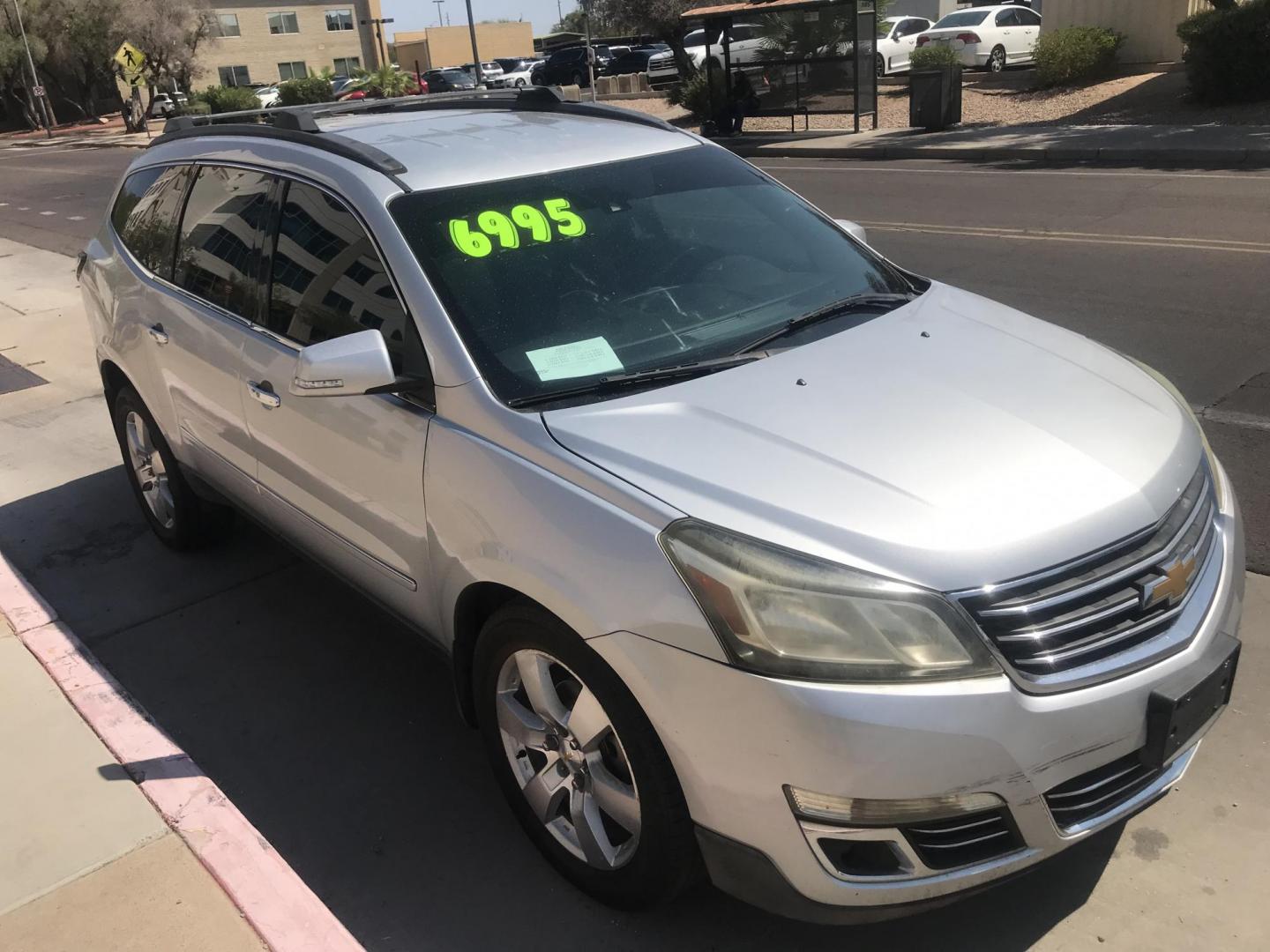 2014 silver /gray and black Chevrolet Traverse LTZ FWD (1GNKRJKD1EJ) with an 3.6L V6 DOHC 24V engine, 6-Speed Automatic transmission, located at 323 E Dunlap Ave., Phoenix, AZ, 85020, (602) 331-9000, 33.567677, -112.069000 - 2014 Chevrolet Traverse LTZ 2WD,........Automatic with 3RD ROW SEATING, Cold A/C, Silver with black leather seats, Touch screen Stereo, Bluetooth, Phone sync, Back-up camera, Satellite compatible, This family suv is in good condition, Clean title , .....passed emissions.....Call or text Dave 602-3 - Photo#5