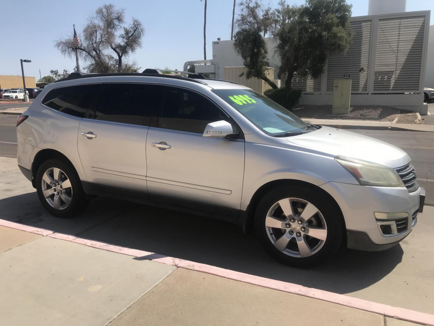 2014 silver /gray and black Chevrolet Traverse LTZ FWD (1GNKRJKD1EJ) with an 3.6L V6 DOHC 24V engine, 6-Speed Automatic transmission, located at 323 E Dunlap Ave., Phoenix, AZ, 85020, (602) 331-9000, 33.567677, -112.069000 - 2014 Chevrolet Traverse LTZ 2WD,........Automatic with 3RD ROW SEATING, Cold A/C, Silver with black leather seats, Touch screen Stereo, Bluetooth, Phone sync, Back-up camera, Satellite compatible, This family suv is in good condition, Clean title , .....passed emissions.....Call or text Dave 602-3 - Photo#6