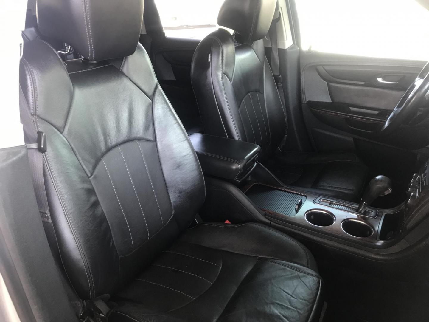 2014 silver /gray and black Chevrolet Traverse LTZ FWD (1GNKRJKD1EJ) with an 3.6L V6 DOHC 24V engine, 6-Speed Automatic transmission, located at 323 E Dunlap Ave., Phoenix, AZ, 85020, (602) 331-9000, 33.567677, -112.069000 - 2014 Chevrolet Traverse LTZ 2WD,........Automatic with 3RD ROW SEATING, Cold A/C, Silver with black leather seats, Touch screen Stereo, Bluetooth, Phone sync, Back-up camera, Satellite compatible, This family suv is in good condition, Clean title , .....passed emissions.....Call or text Dave 602-3 - Photo#8