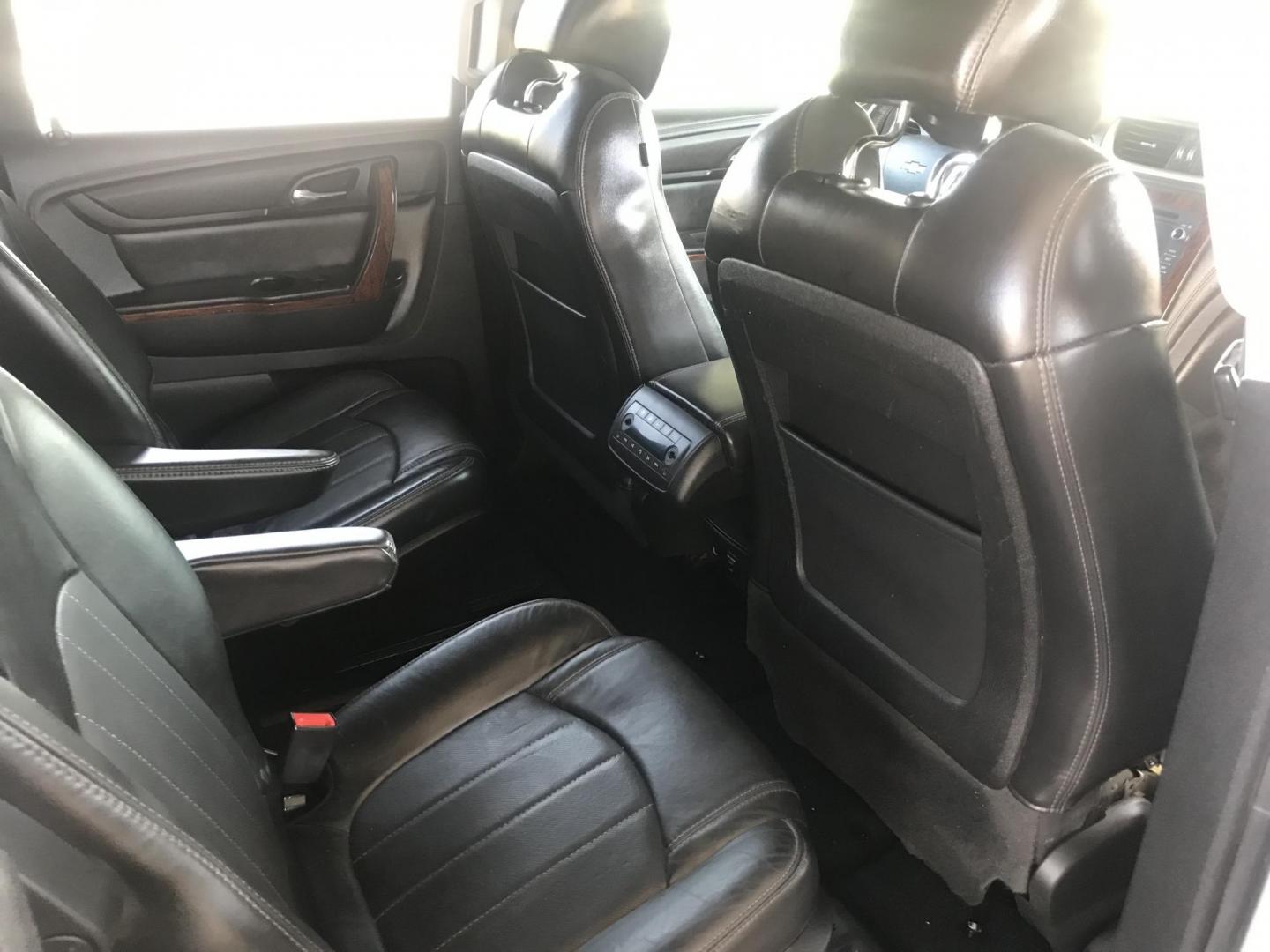 2014 silver /gray and black Chevrolet Traverse LTZ FWD (1GNKRJKD1EJ) with an 3.6L V6 DOHC 24V engine, 6-Speed Automatic transmission, located at 323 E Dunlap Ave., Phoenix, AZ, 85020, (602) 331-9000, 33.567677, -112.069000 - 2014 Chevrolet Traverse LTZ 2WD,........Automatic with 3RD ROW SEATING, Cold A/C, Silver with black leather seats, Touch screen Stereo, Bluetooth, Phone sync, Back-up camera, Satellite compatible, This family suv is in good condition, Clean title , .....passed emissions.....Call or text Dave 602-3 - Photo#9