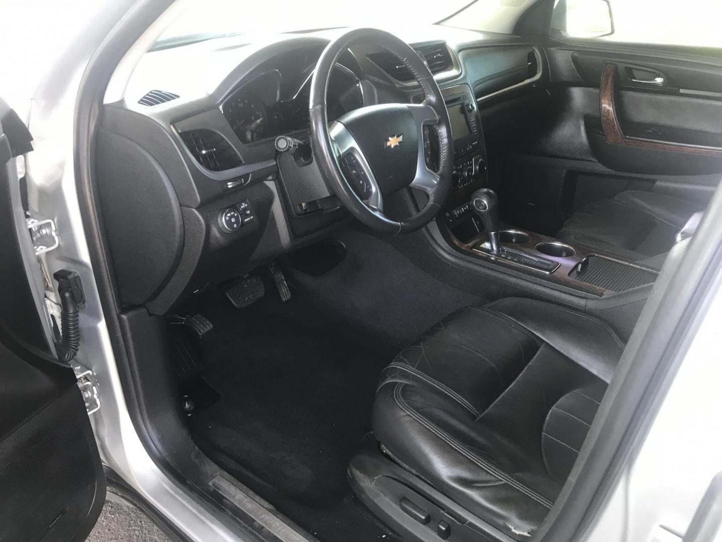 2014 silver /gray and black Chevrolet Traverse LTZ FWD (1GNKRJKD1EJ) with an 3.6L V6 DOHC 24V engine, 6-Speed Automatic transmission, located at 323 E Dunlap Ave., Phoenix, AZ, 85020, (602) 331-9000, 33.567677, -112.069000 - 2014 Chevrolet Traverse LTZ 2WD,........Automatic with 3RD ROW SEATING, Cold A/C, Silver with black leather seats, Touch screen Stereo, Bluetooth, Phone sync, Back-up camera, Satellite compatible, This family suv is in good condition, Clean title , .....passed emissions.....Call or text Dave 602-3 - Photo#13