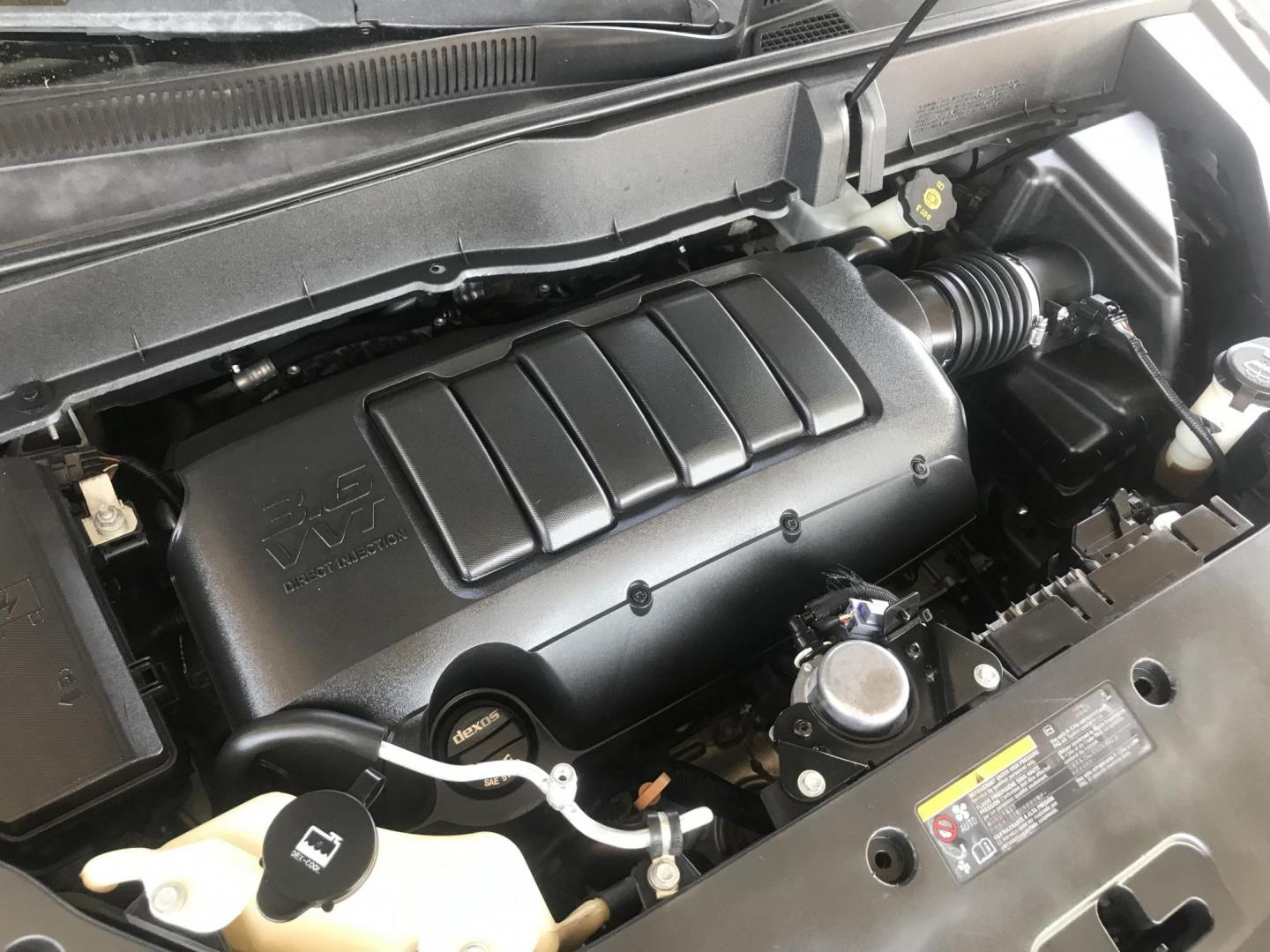 2014 silver /gray and black Chevrolet Traverse LTZ FWD (1GNKRJKD1EJ) with an 3.6L V6 DOHC 24V engine, 6-Speed Automatic transmission, located at 323 E Dunlap Ave., Phoenix, AZ, 85020, (602) 331-9000, 33.567677, -112.069000 - 2014 Chevrolet Traverse LTZ 2WD,........Automatic with 3RD ROW SEATING, Cold A/C, Silver with black leather seats, Touch screen Stereo, Bluetooth, Phone sync, Back-up camera, Satellite compatible, This family suv is in good condition, Clean title , .....passed emissions.....Call or text Dave 602-3 - Photo#15