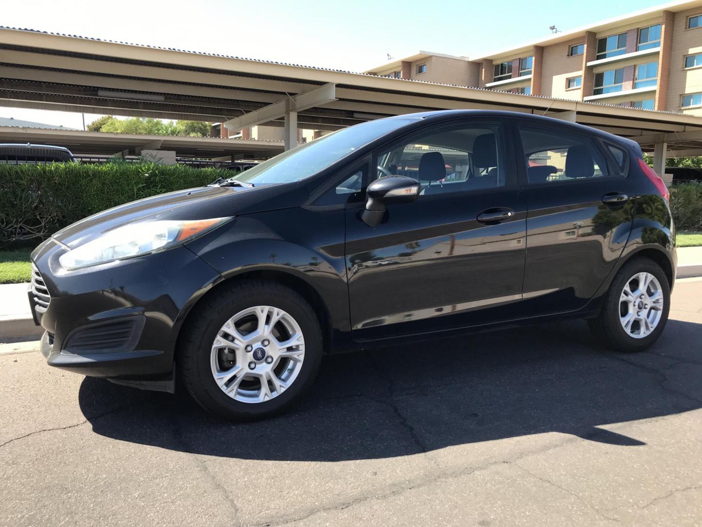 2016 black /gray Ford Fiesta SE Hatchback (3FADP4EJ6GM) with an 1.6L L4 DOHC 16V engine, automatic transmission, located at 323 E Dunlap Ave., Phoenix, AZ, 85020, (602) 331-9000, 33.567677, -112.069000 - 2016 Ford Fiesta SE,.....A Must See!!...Automatic, 1.6L Engine, Super Economical -- 160k miles .... Ice cold AC. The car is gorgeous inside and out. Power windows, Power door locks, Stereo/ CD Player, Phone sync, Bluetooth, Beautiful black exterior with gray cloth seats in near perfect condition, Cl - Photo#2